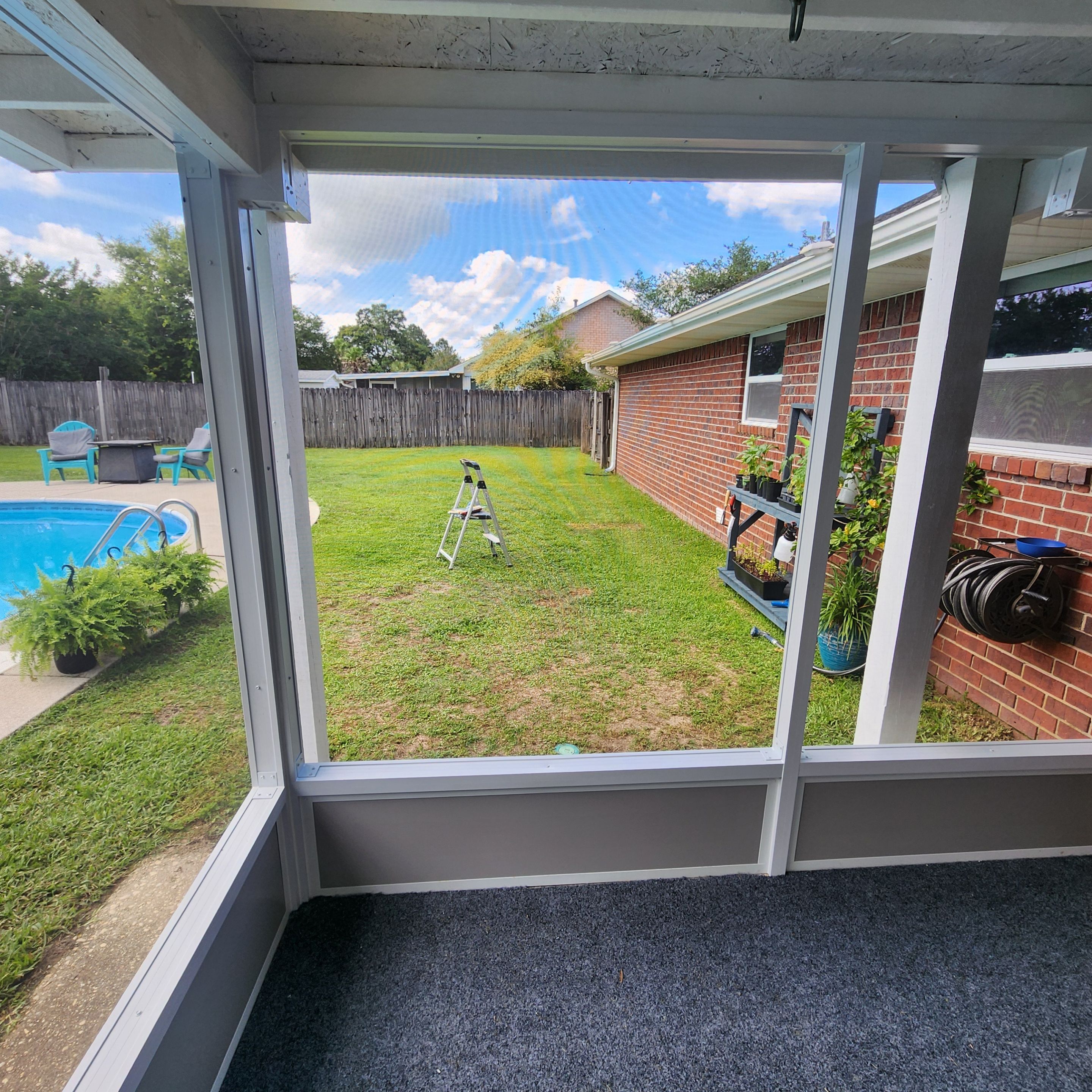 Screen Room Built Under Existing Roof by Titan Sunrooms