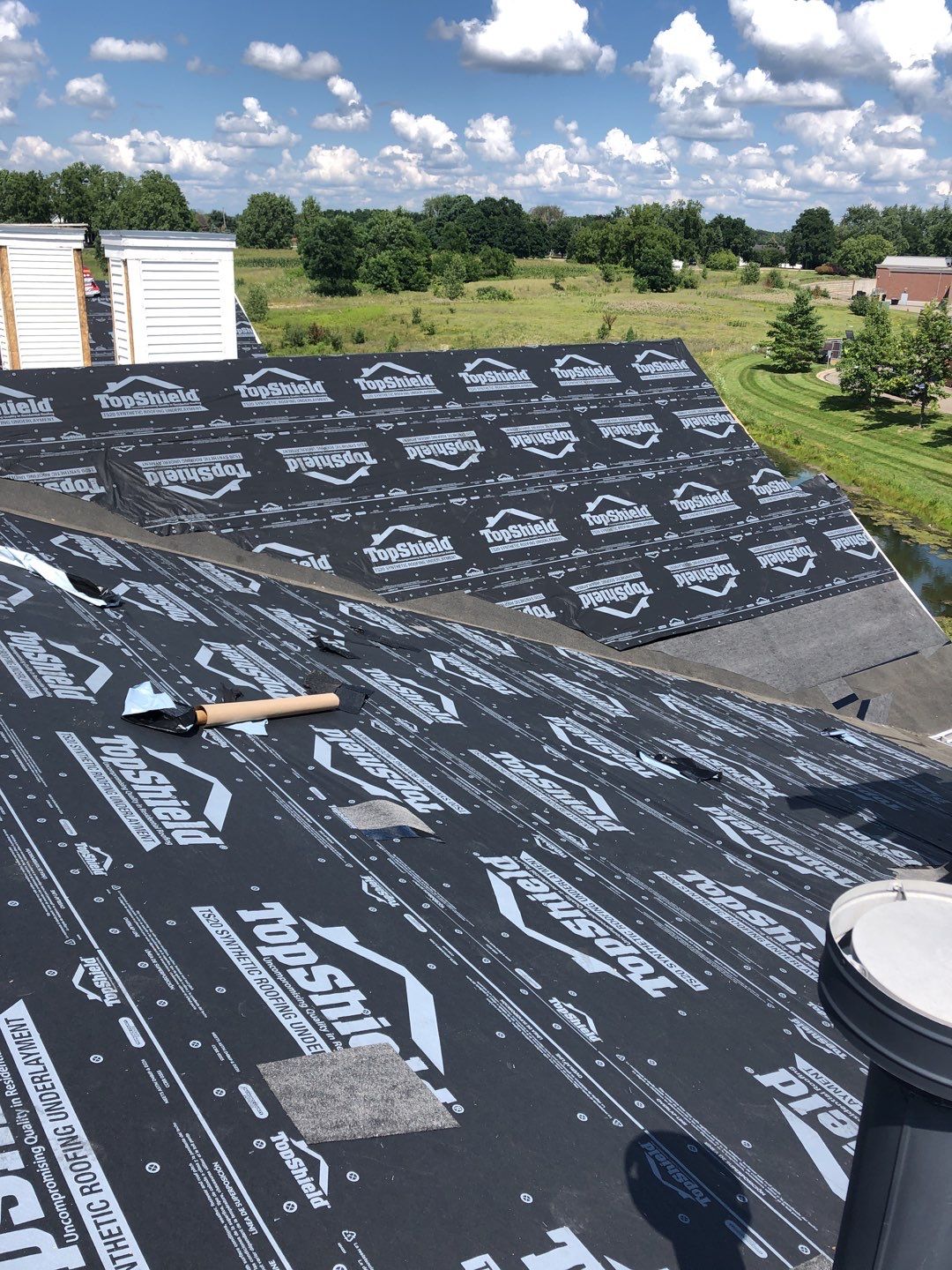 Multi Family Large Scale Roof Replacement by Bloomfield Construction & Restoration