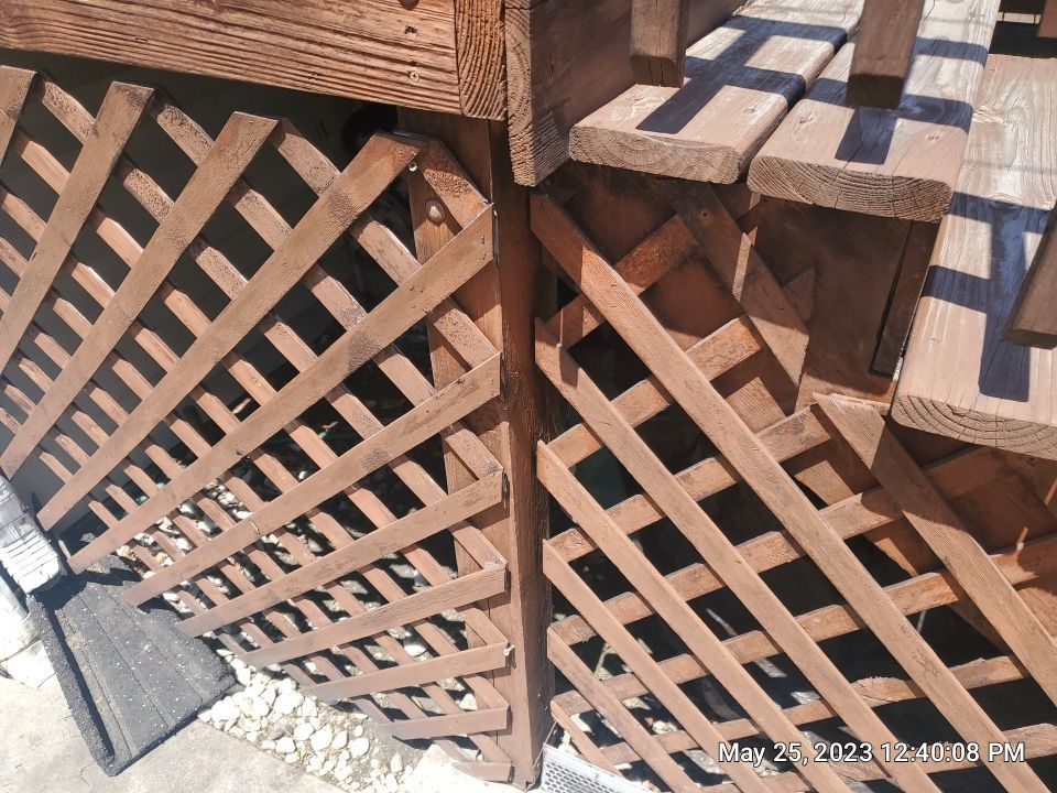 Wood cleaning and staining using Armstrong cloark oil stain by Northern Power Washing LLC.