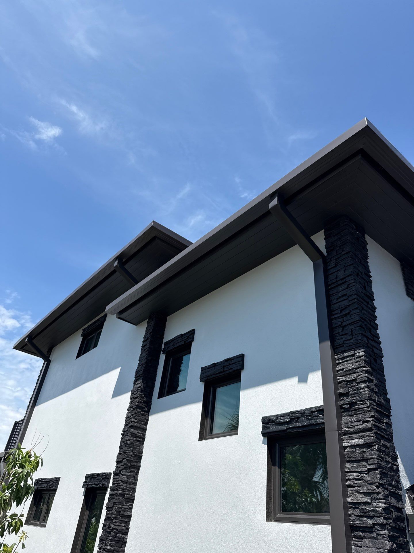 7-Inch Smooth Box Seamless Gutters using black seamless gutters in Siesta Key Fl by Gutter Professors