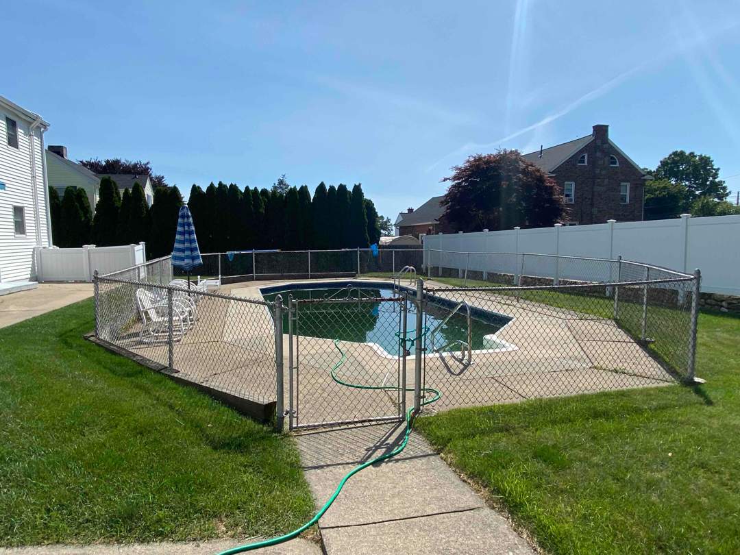 Black Aluminum Pool Fence by DiGiorgi Roofing and Siding Inc