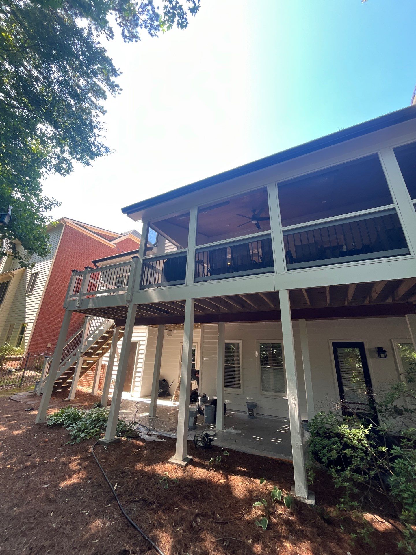 Deck Stain and Rotten Wood Replacement with James Hardie and Sherwin-Williams Products by Nelson Exteriors