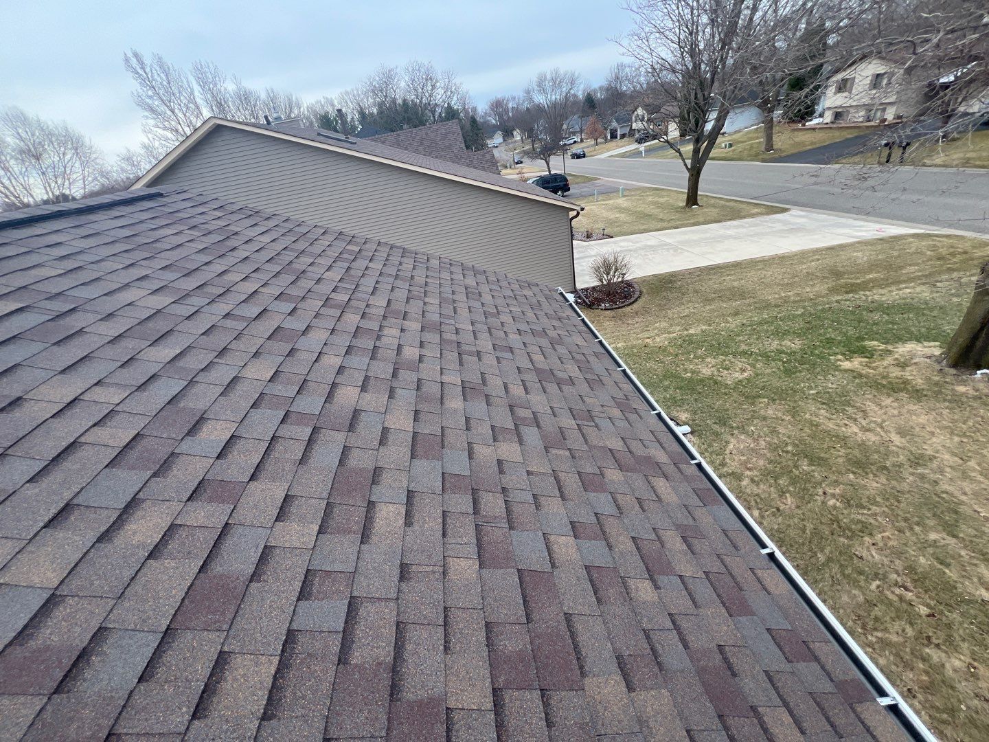 Hail Damage Roof Replacement – Owens Corning Duration in Teak | Cottage Grove, MN by First Impressions Exteriors