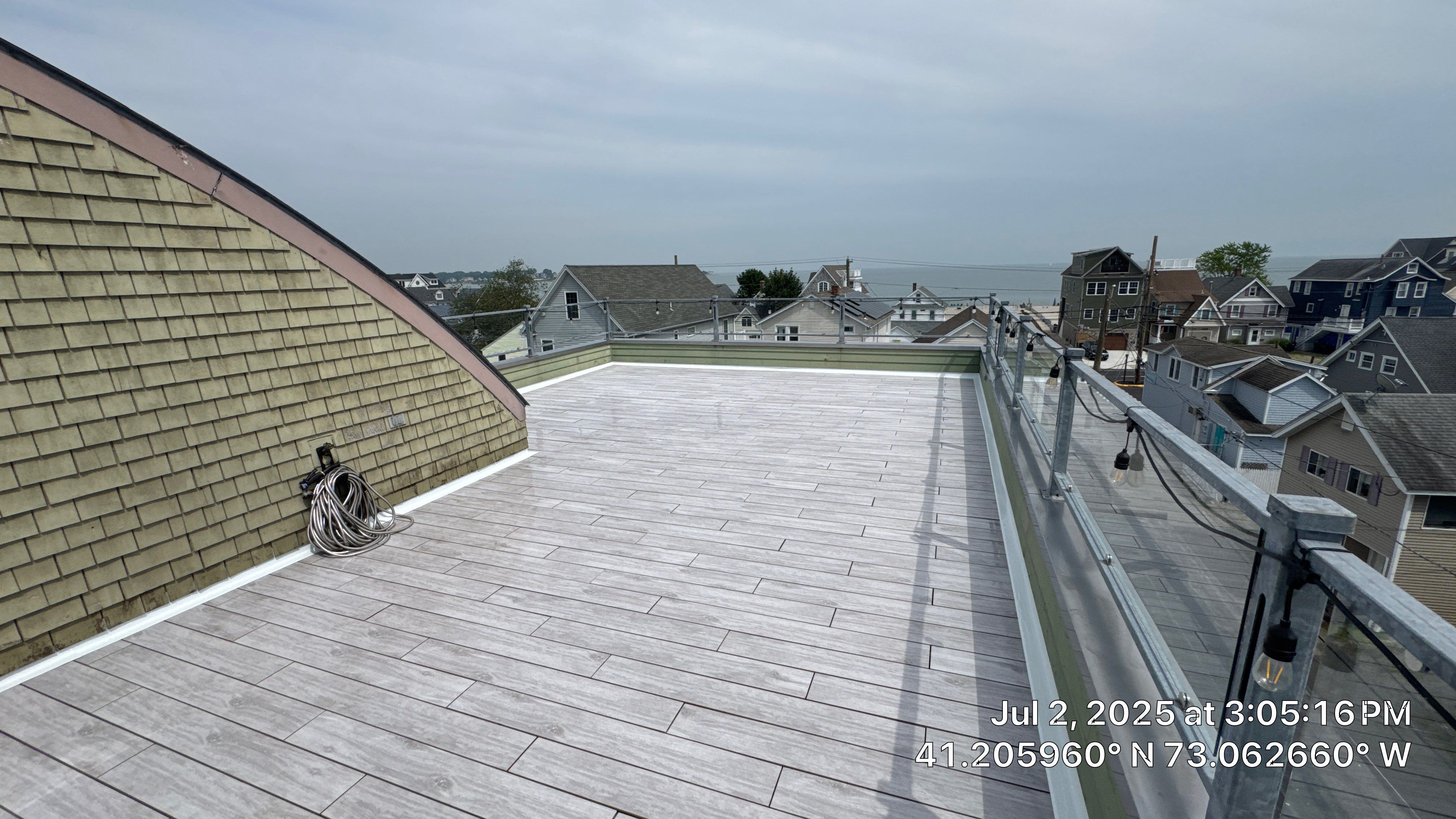 Deck Installation using Tanzite Stone Decking by A Plus Exterior