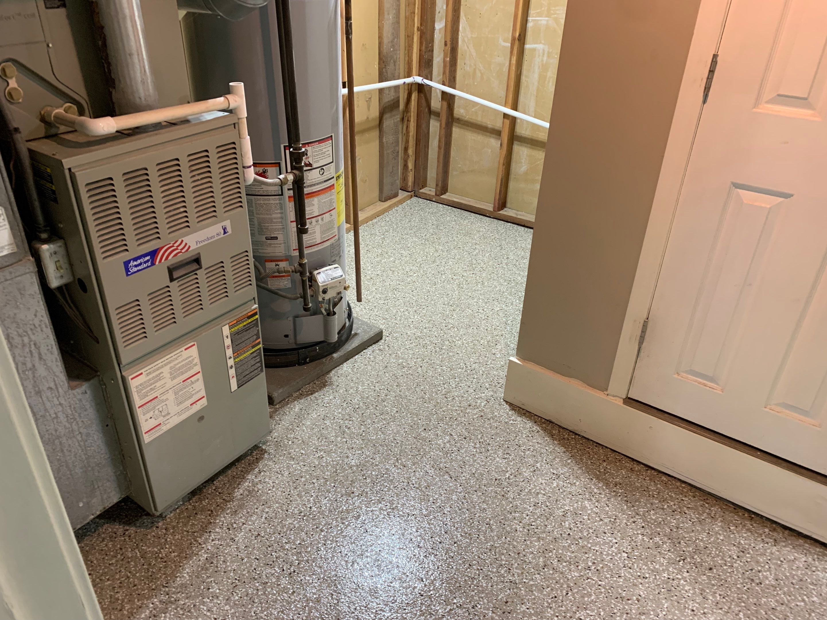 Basement using Pebble Beach by Select Painting, Coatings & Garage Cabinets