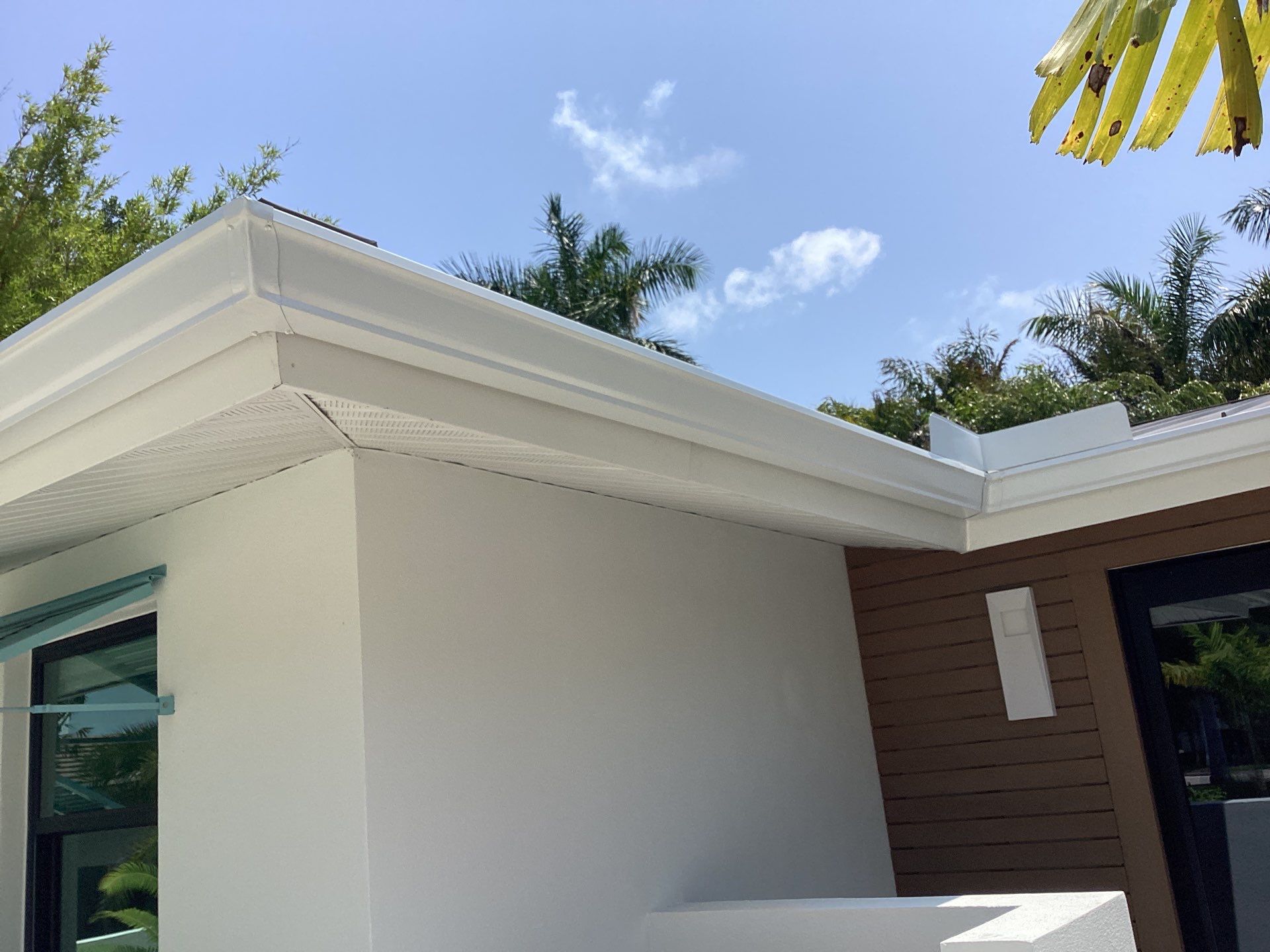 White Seamless Gutters and Downspouts in Sarasota FL by Gutter Professors