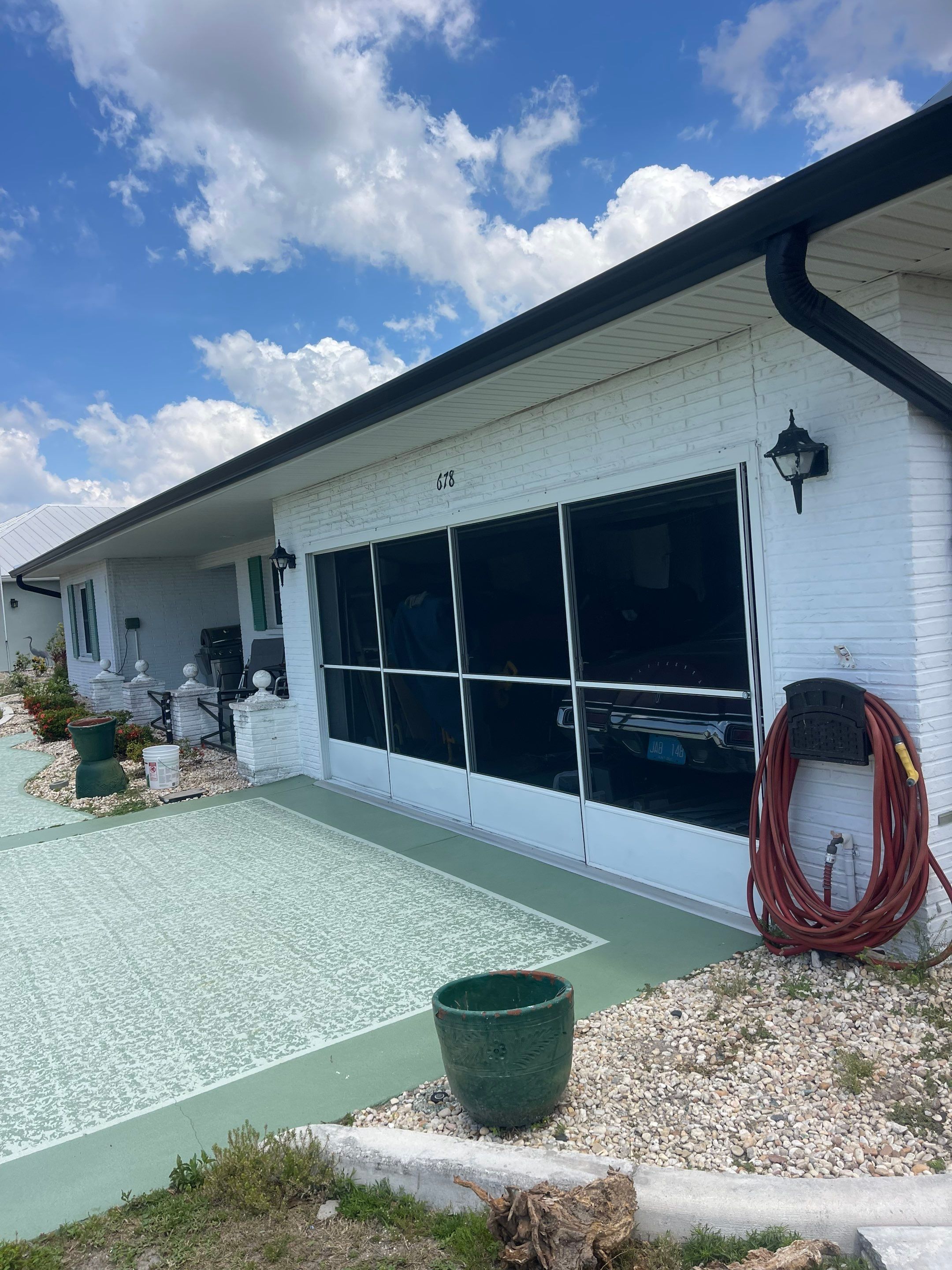 Black Aluminum Gutters Installation in Sun City Center FL by Gutter Professors
