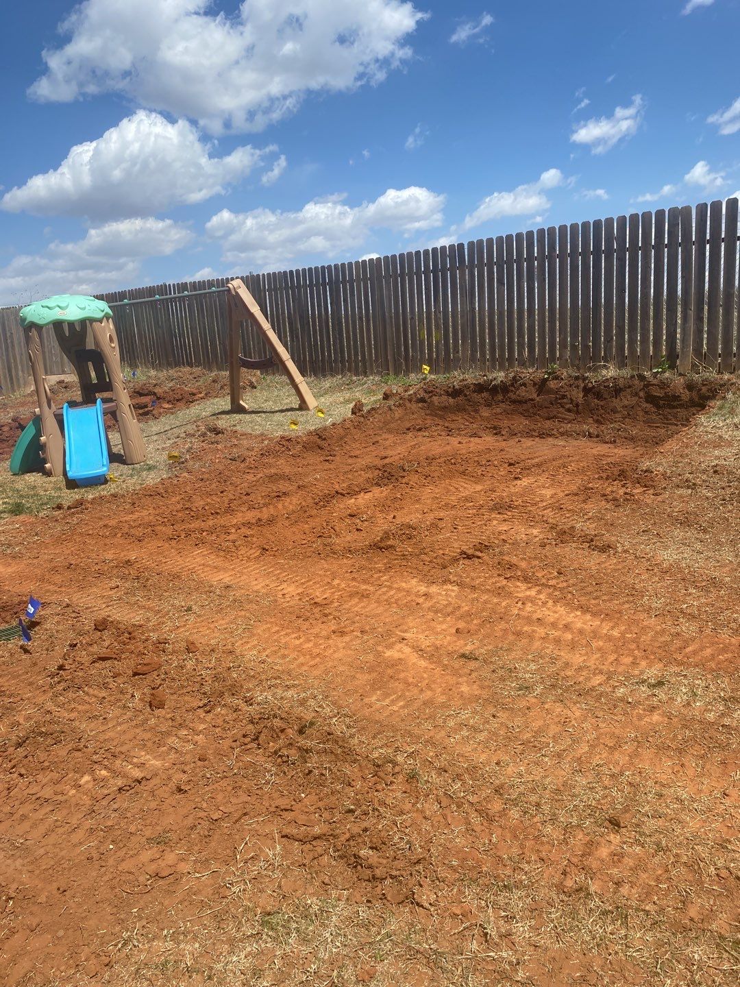 Retaining wall / Playground by Clays Services Inc