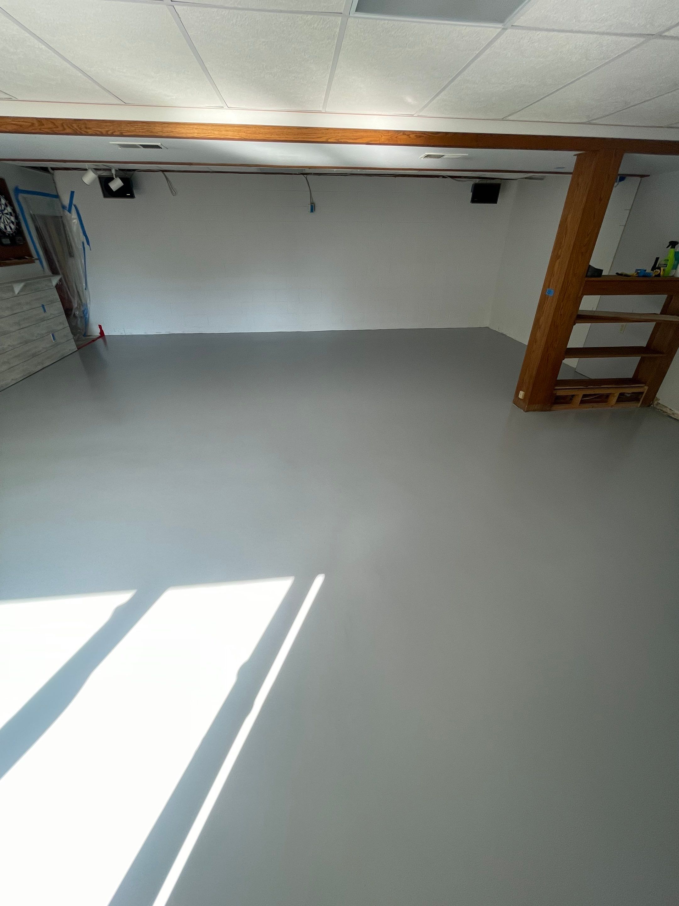 Solid Color Concrete Floor Coating for Renner Basement by Select Painting, Coatings & Garage Cabinets