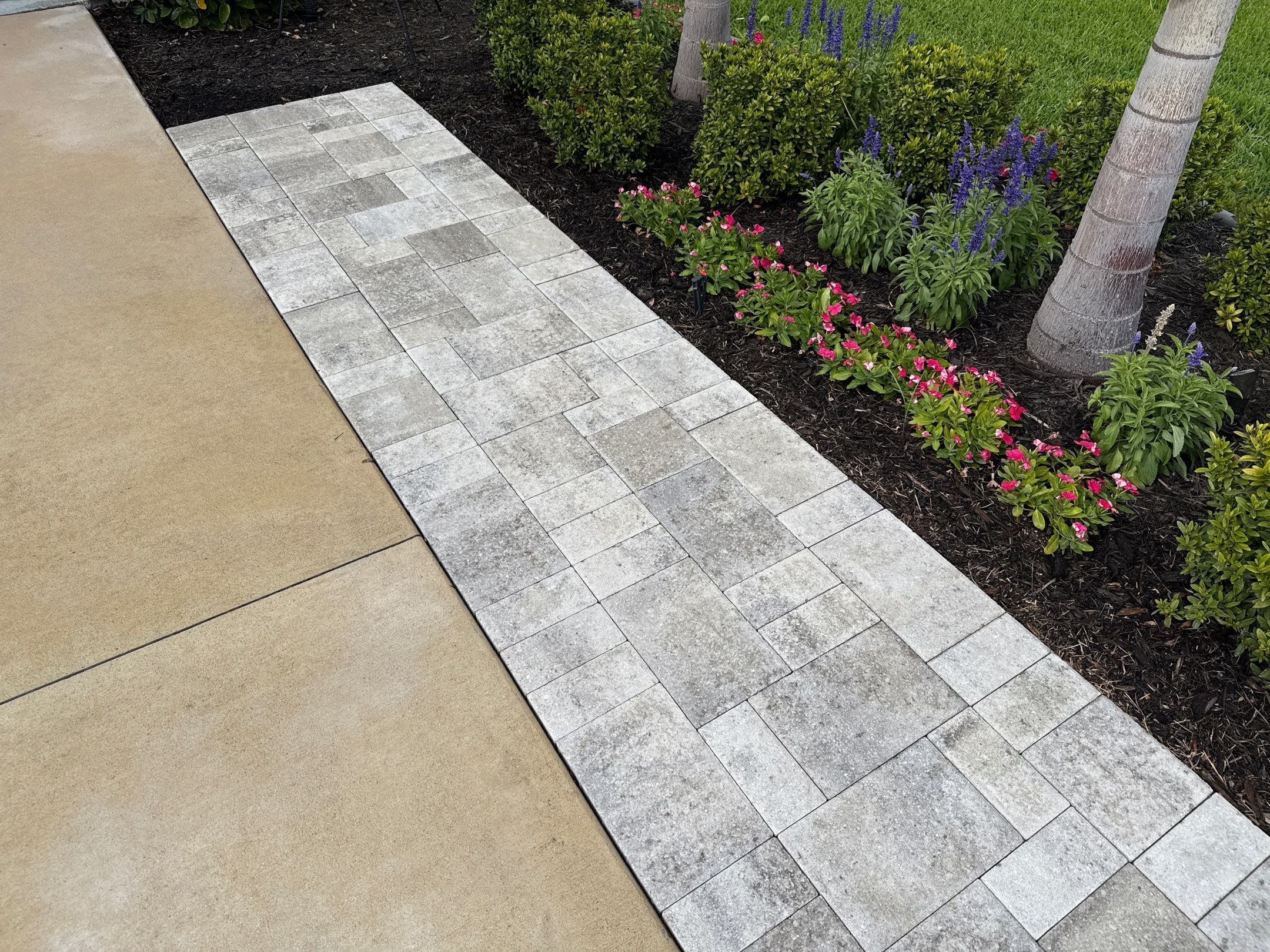 Rust Stain Removal from Concrete Driveway and Pavers in Park East at Azario | Lakewood Ranch, FL by Sunshine AquaWash