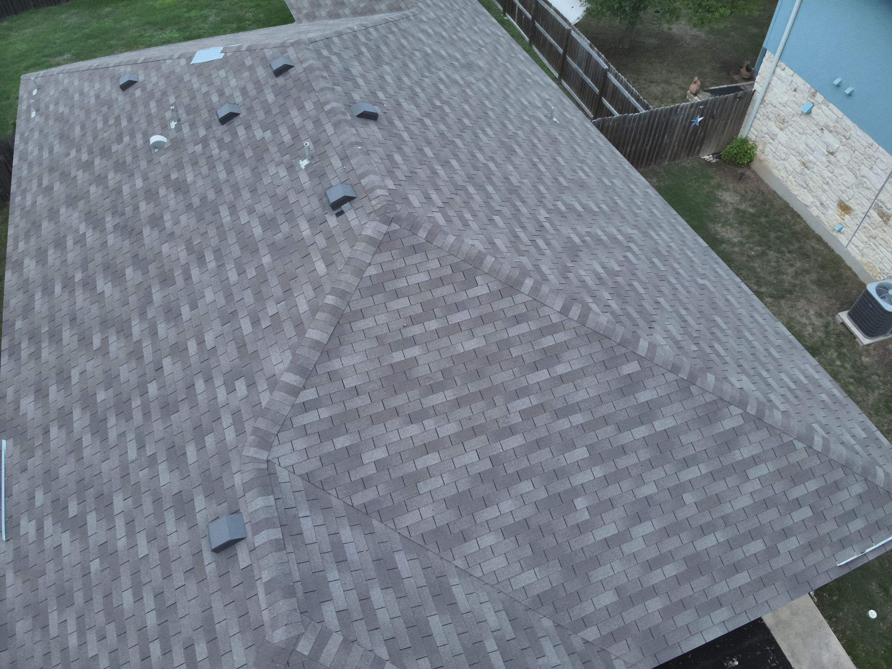 Residential Roof Replacement and Storm Damage Restoration in Leander by Caliber Restoration LLC