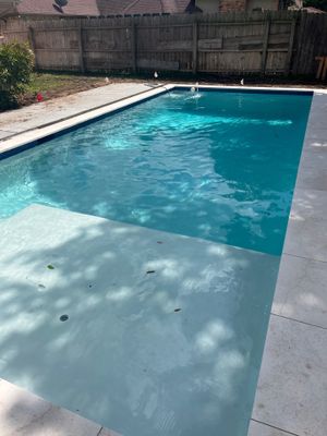 Modern Geometric Pool with Tanning Ledge