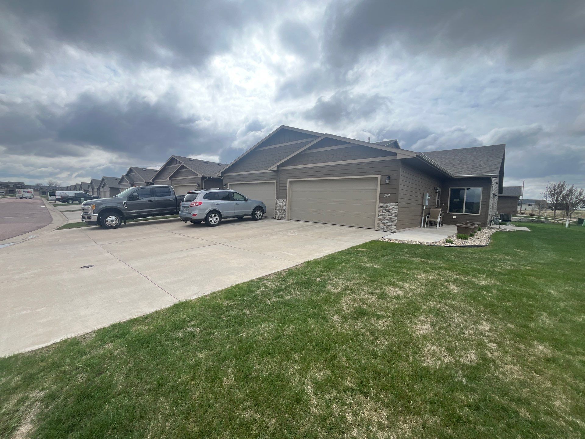 Exterior Painting for Multi-Unit Townhomes in Sioux Falls by Select Painting, Coatings & Garage Cabinets