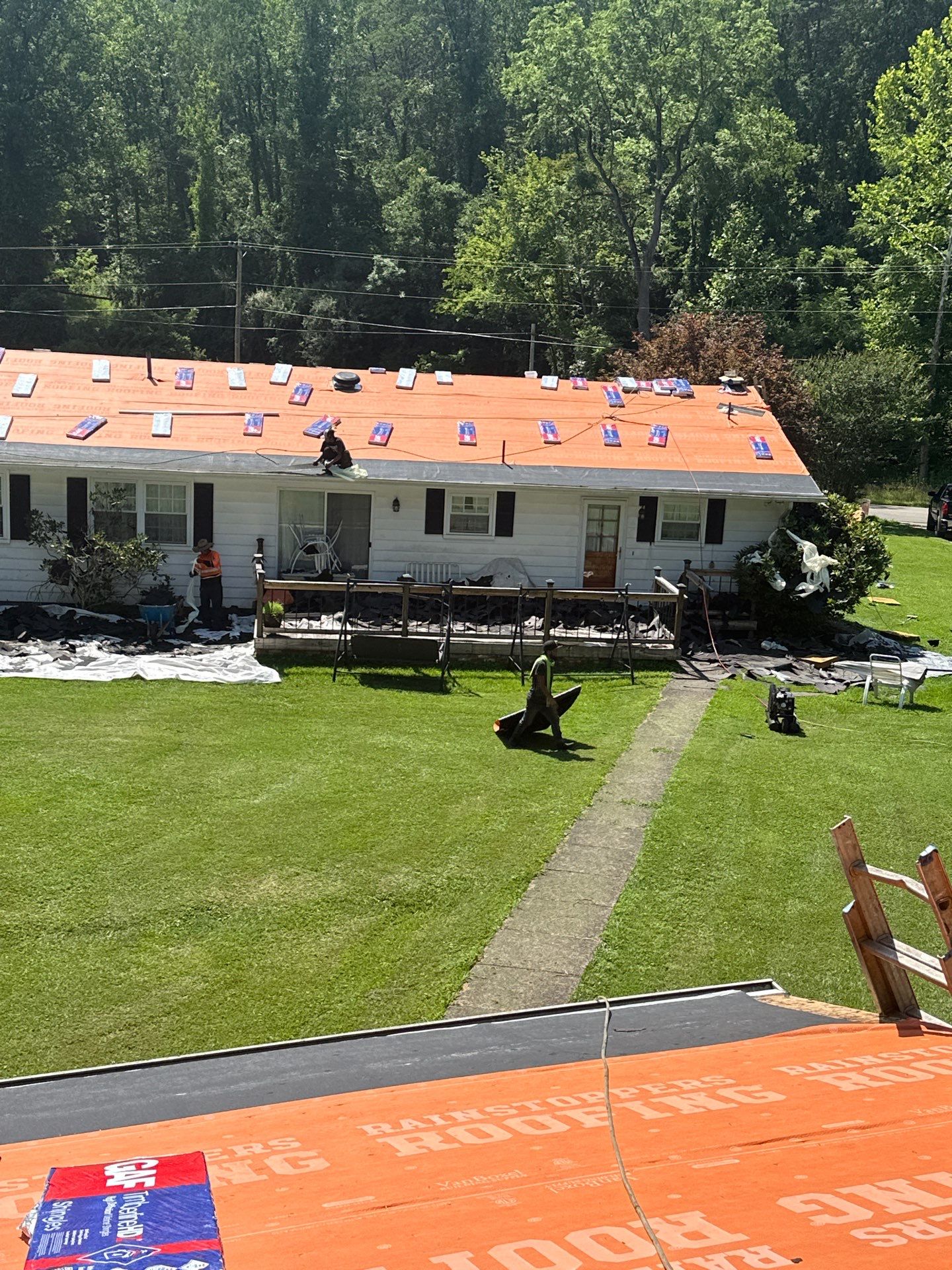 Residential Roofing Installation using GAF Timberline HDZ Charcoal by Rainstoppers Roofing
