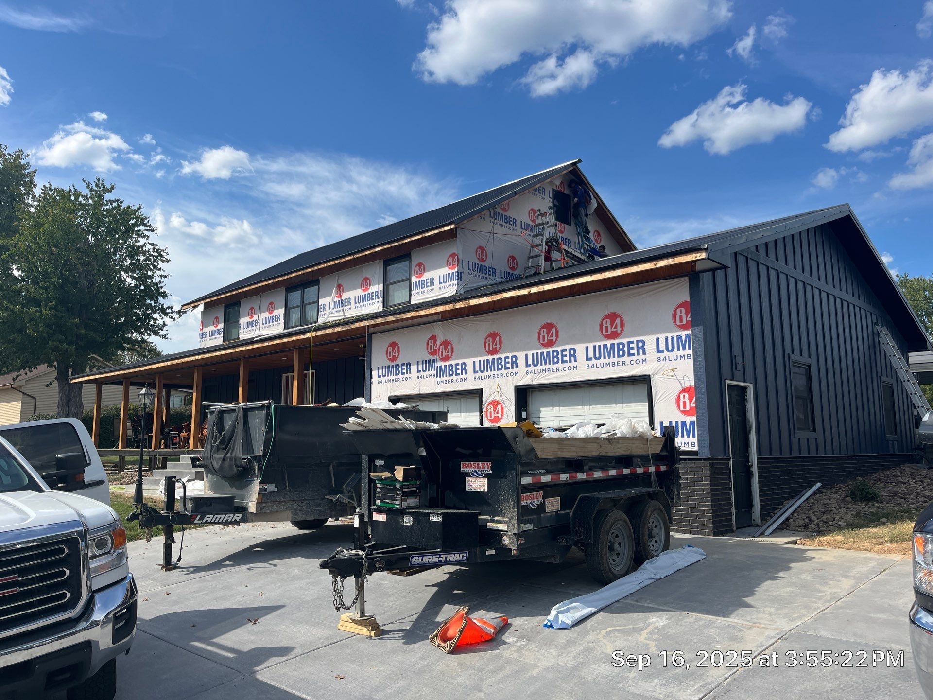 Siding and Metal Roof by Fahey Roofing + Contracting