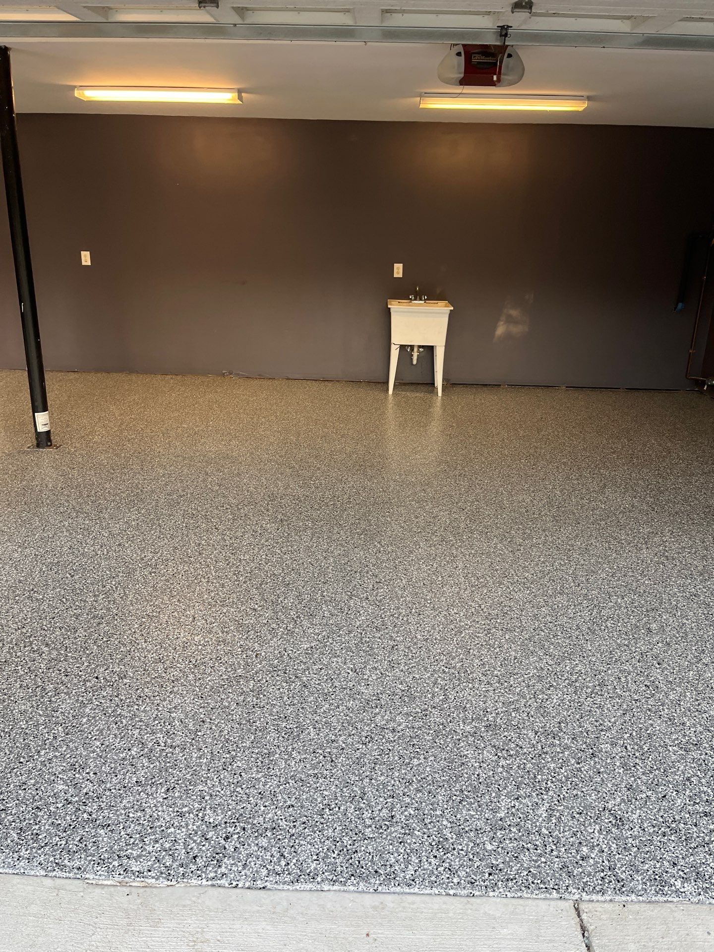 Garage Floor Coating using Wombat by My Garage Floor Guys