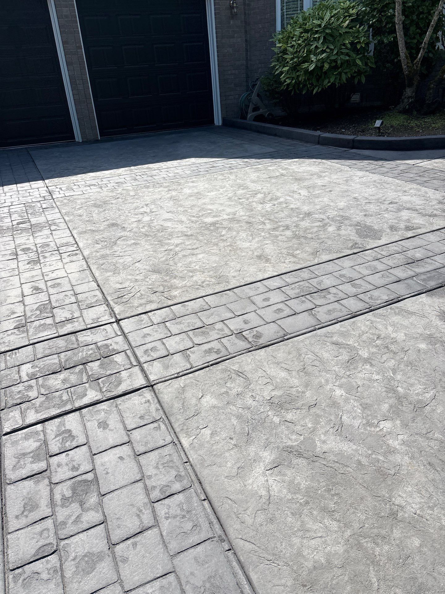 Multi-color Stamped & Sealed Concrete Driveway Renovation | Mukilteo by Jireh Asphalt & Concrete Inc