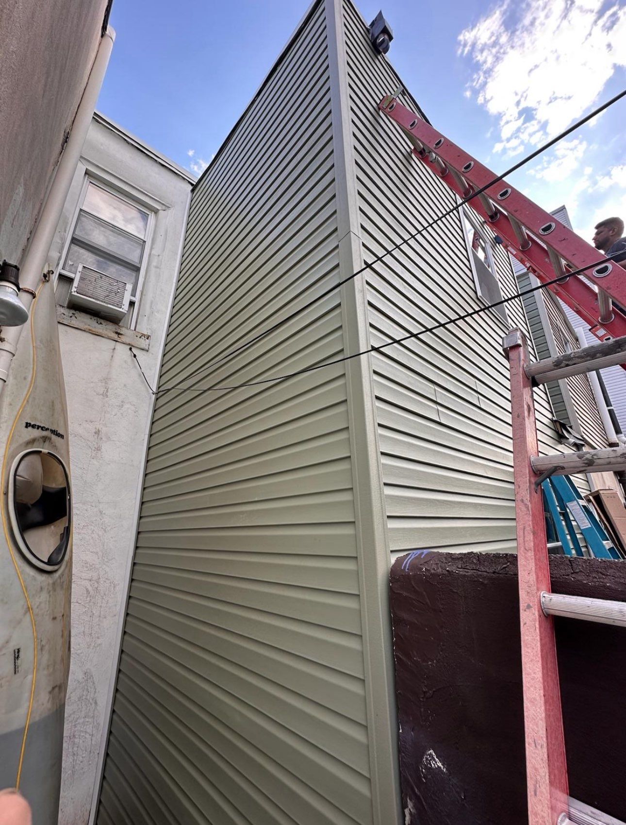 Back Wall Siding Replacement & Breezeway Roof. by Philadelphia Quality Roofing