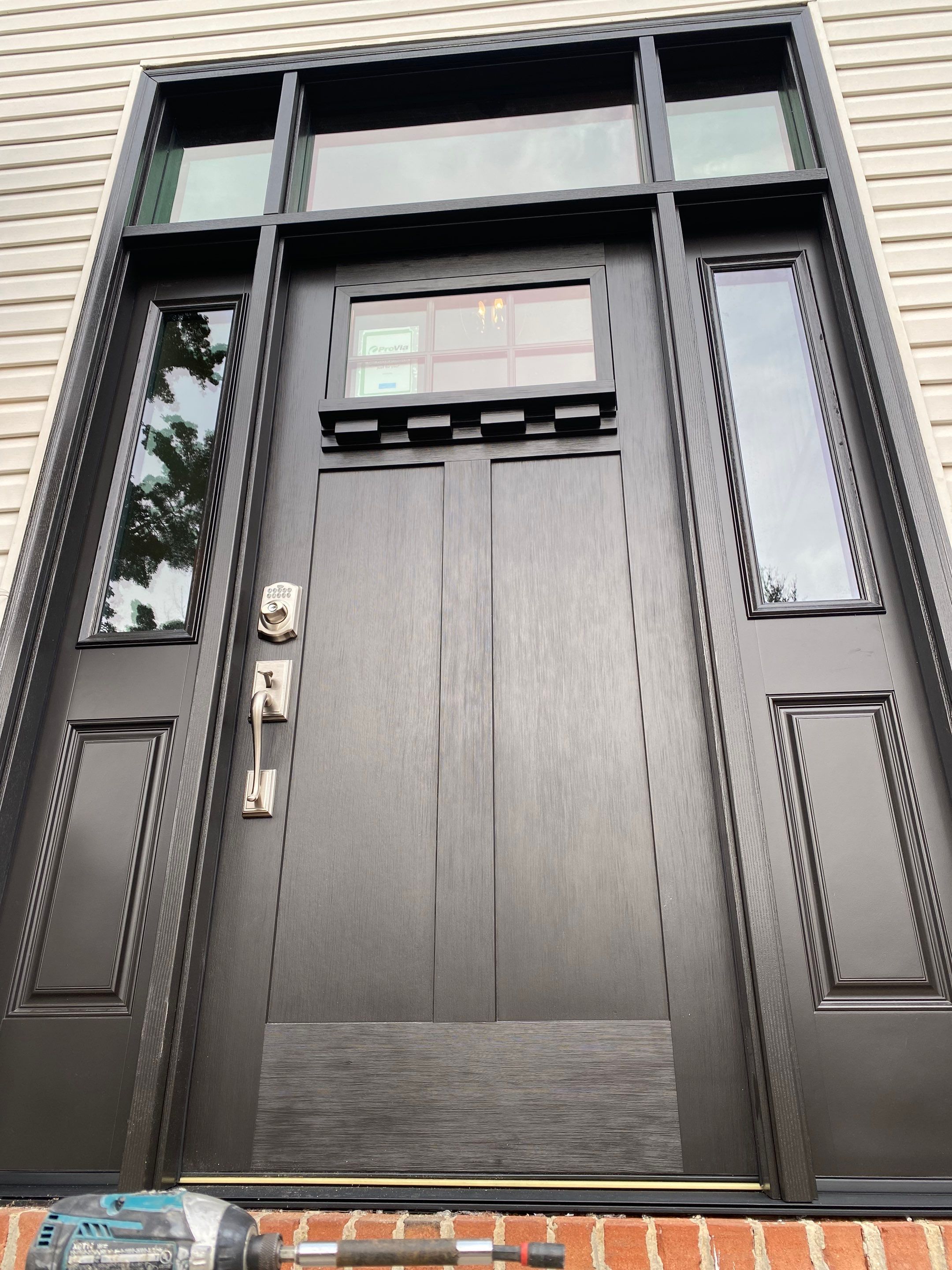 "🚪✨ Out with the old, in with the bold! Esh Builders just upgraded another customer's home to a custom Signet Entry Door by Provia MFG, blending style and durability right at your doorstep. #NewBeginnings #EshBuilders #HomeSweetHome 🏡💖" by Esh Builders