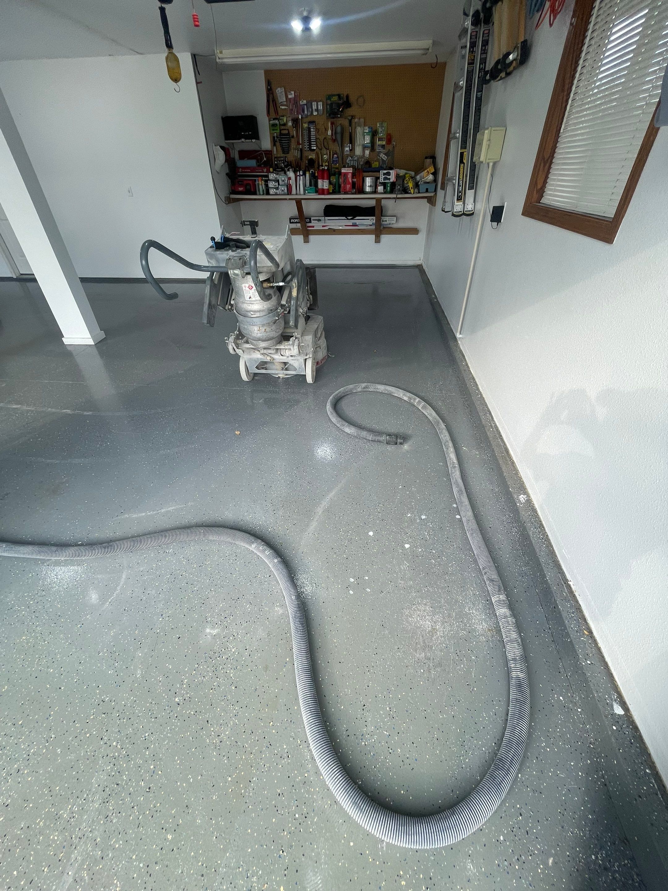 Multi-Car Garage Concrete Coating with Coyote Flake Finish in Sioux Falls by Select Painting, Coatings & Garage Cabinets