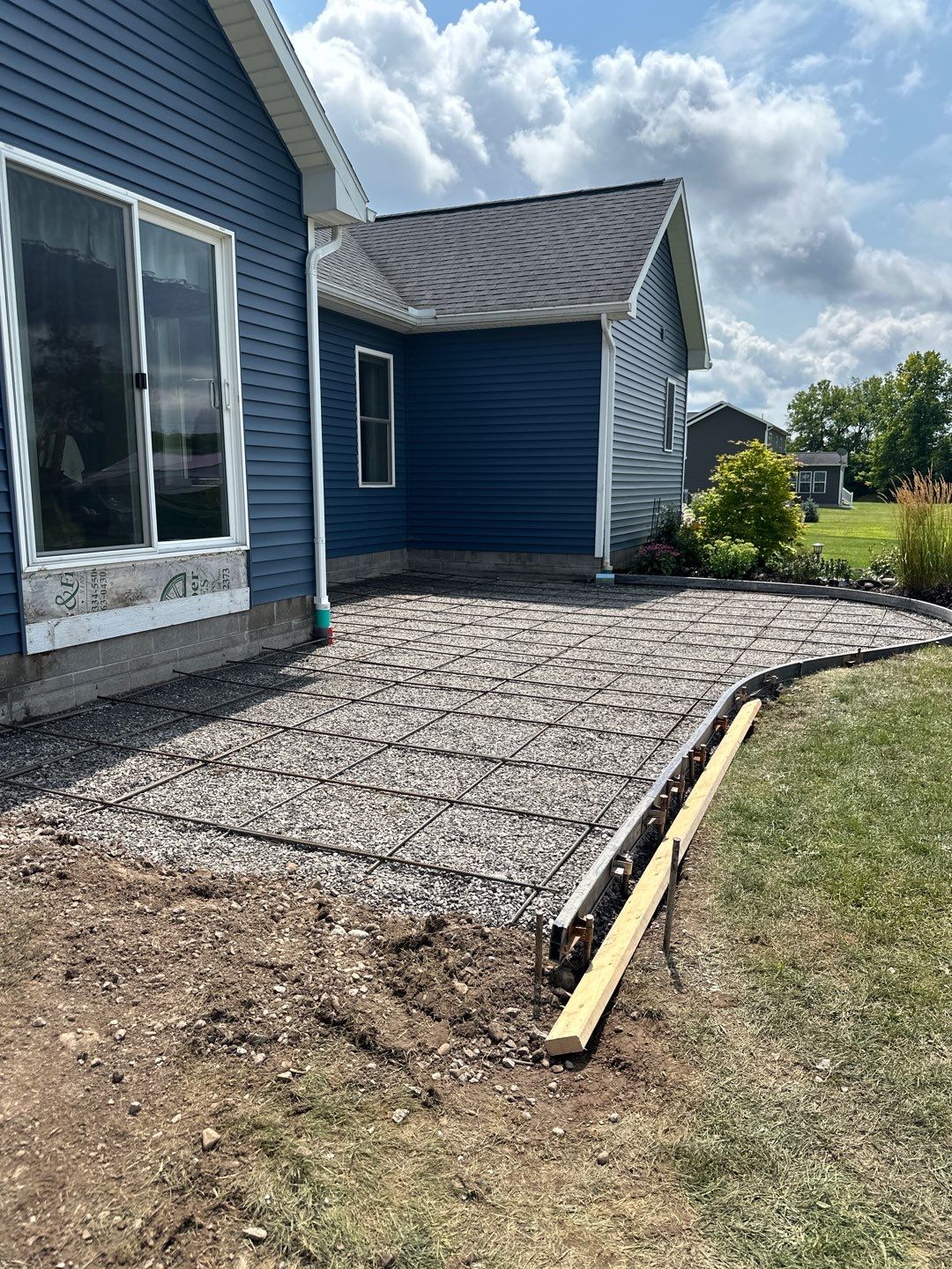 Slate stamped concrete patio  by NG Masonry & Construction LLC