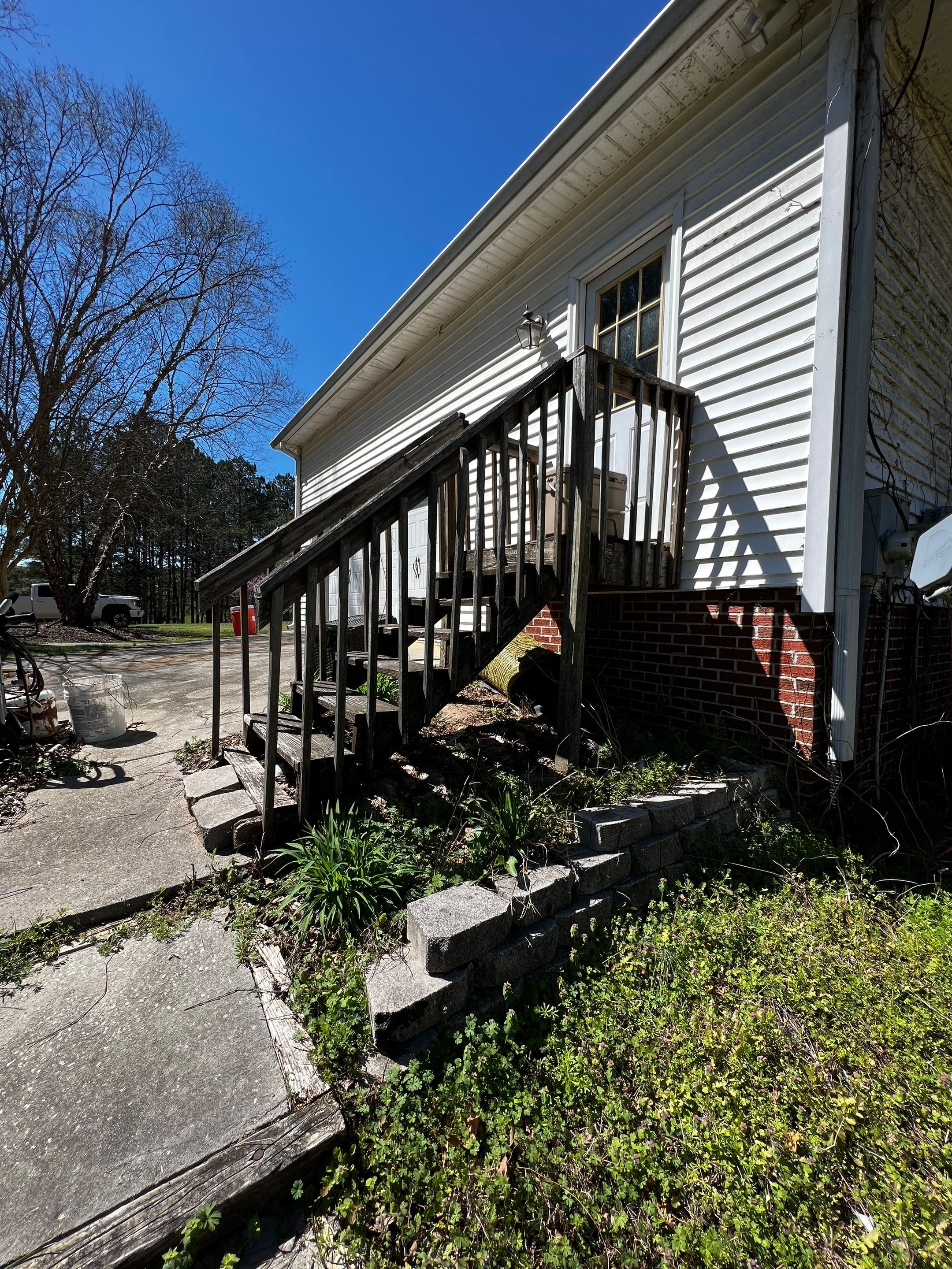 Pressure-Treated Wood Deck and Side Porch Replacement in Dacula by Swift Home Renovations