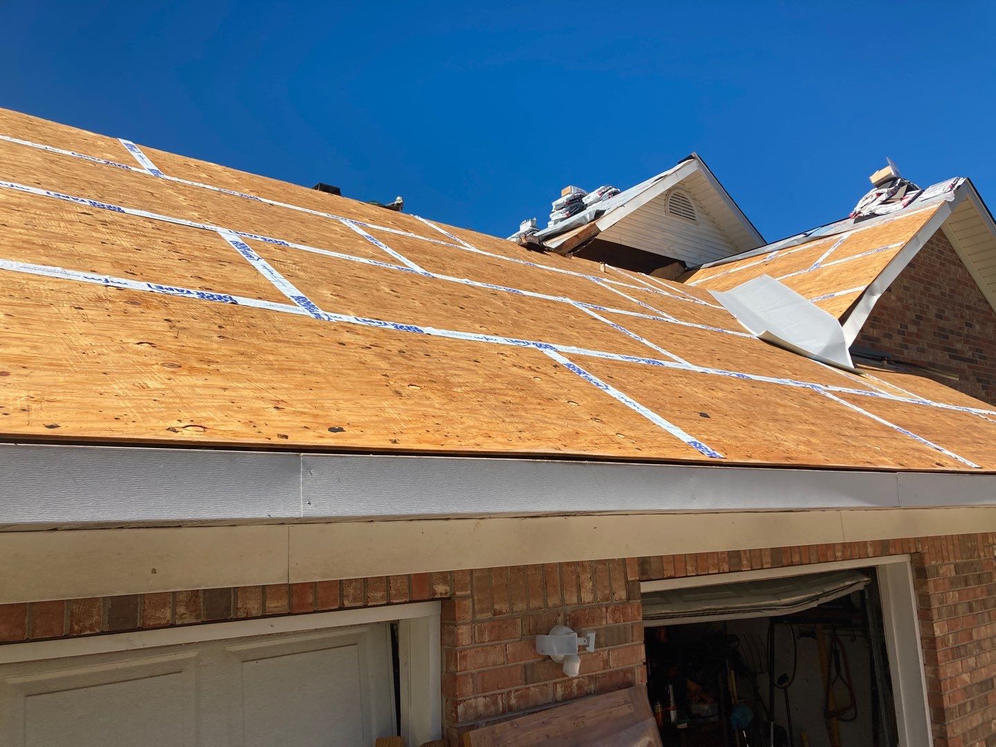 Residential Roofing Installation using Roof Replacement by American Roofing & Construction LLC