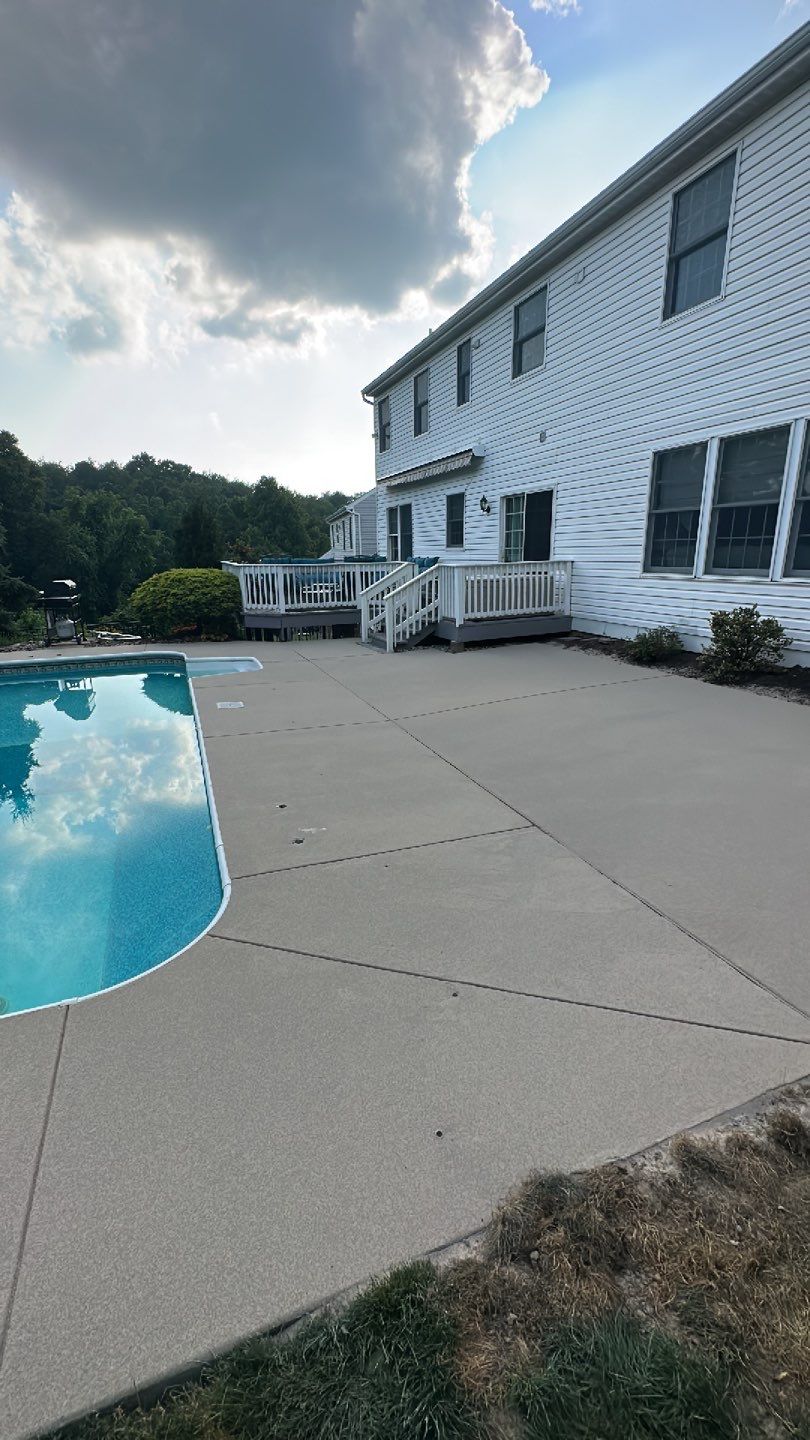 Pool Deck + Driveway + Garage Project in Venetia by Floors in a Day, Inc