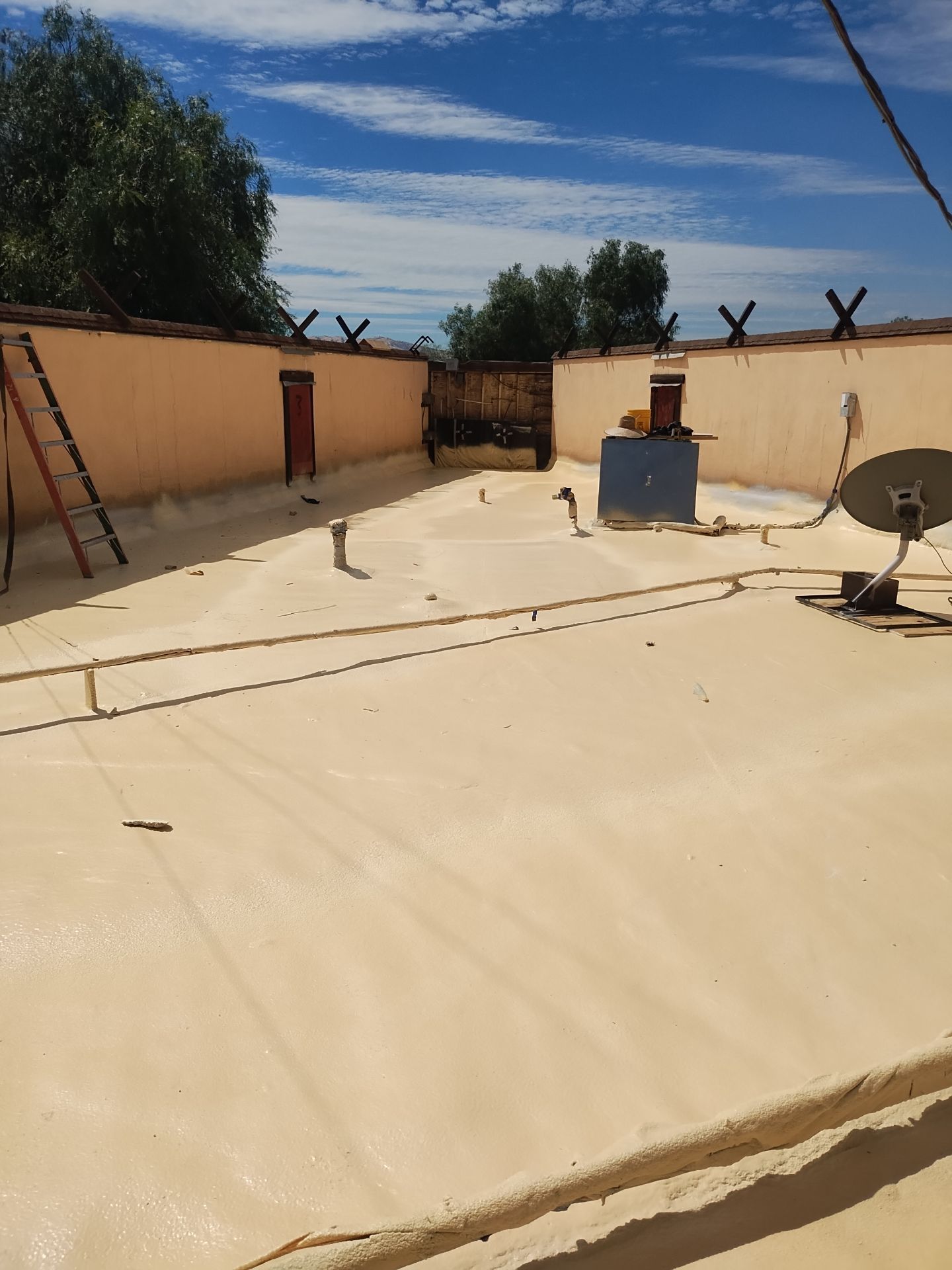 Spray foam and coatings using General Coatings acrylic coatings and spray foam by Straight Edge Roofing Inc