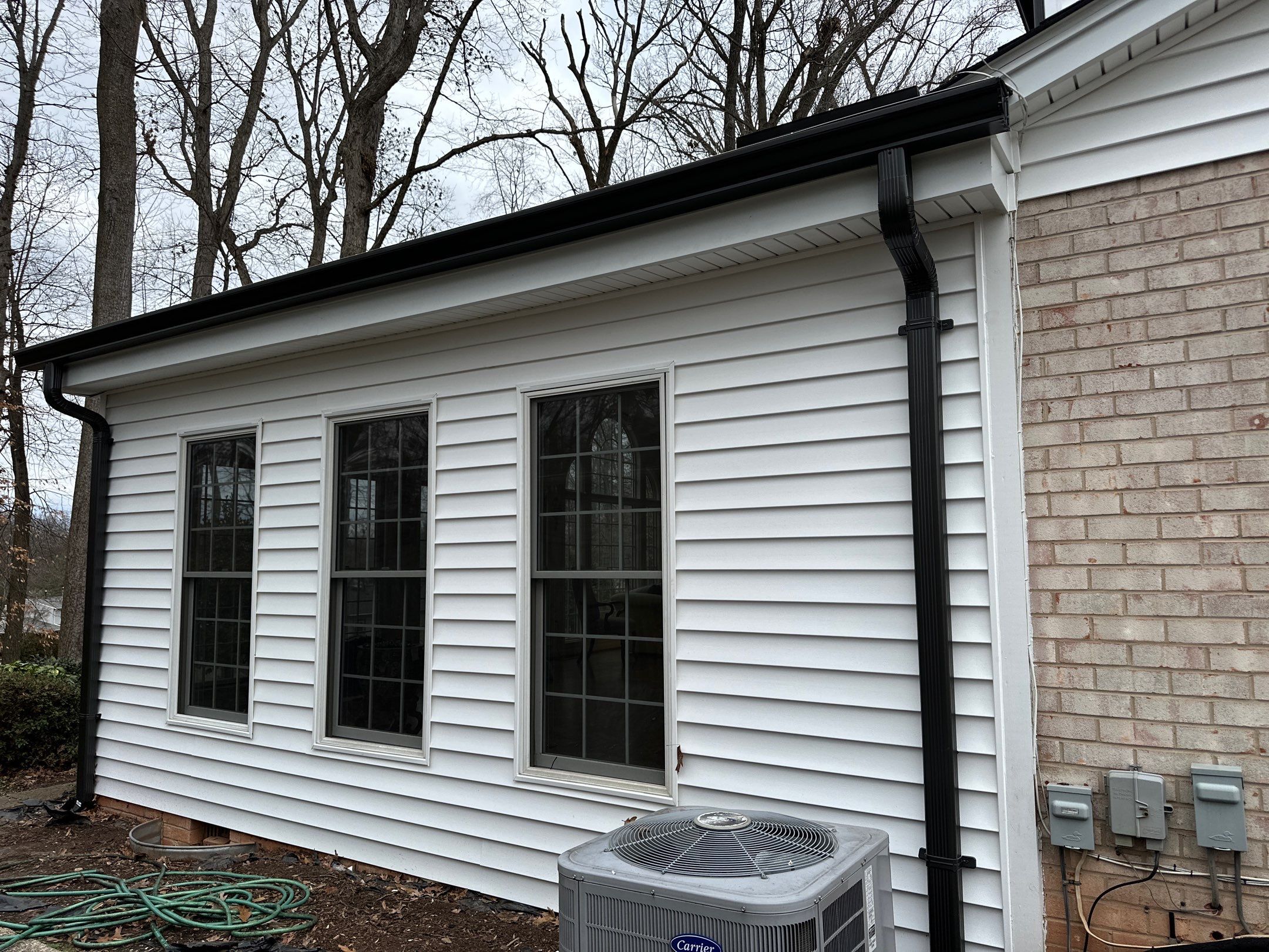 Springfield CertainTeed Charcoal Black Roof & CertainTeed Colonial White Siding by RM Banning, Inc.