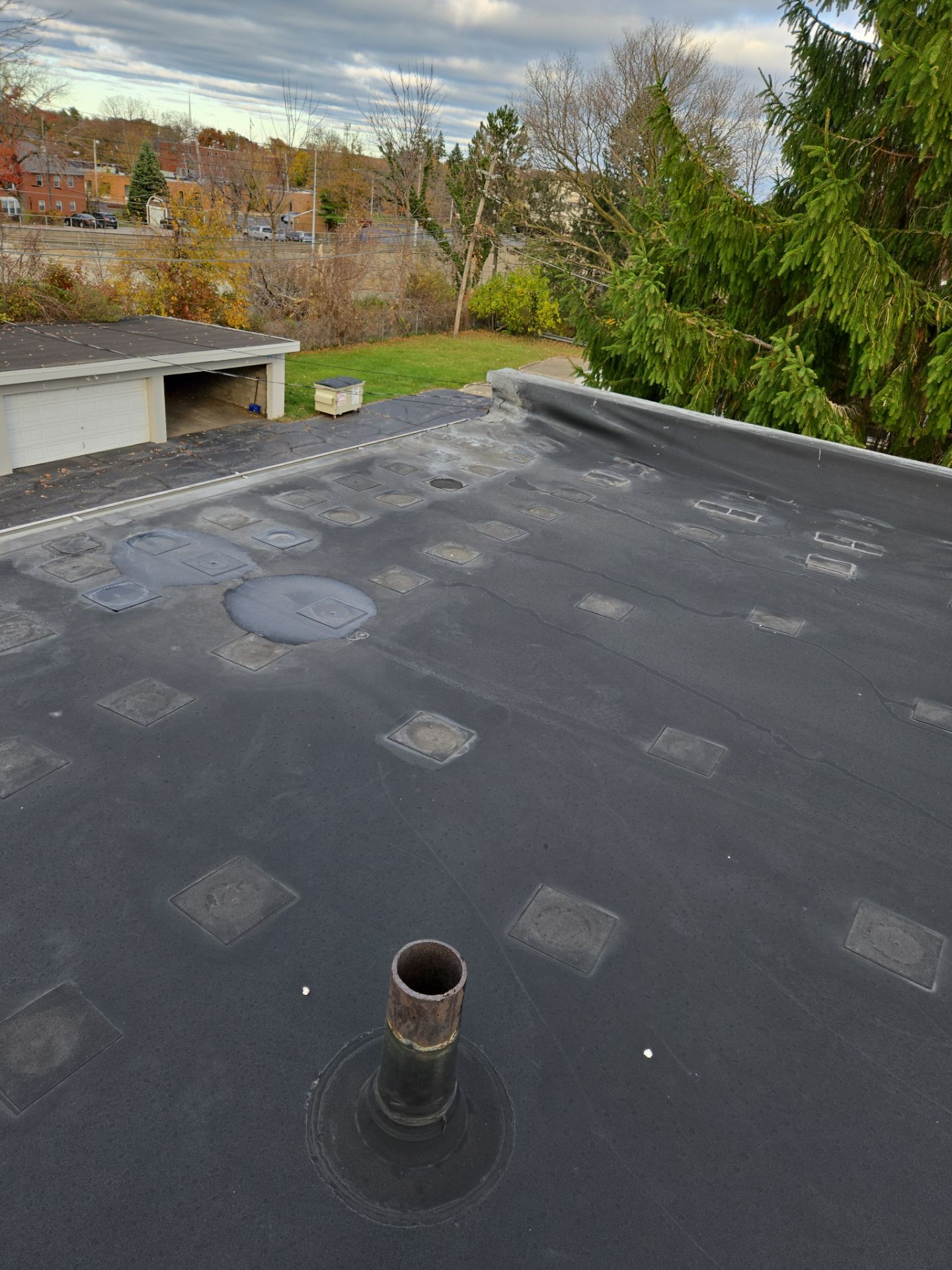 Commercial Roofing Installation using Duro-Last 50 mil PVC by 3 Daughters Construction 