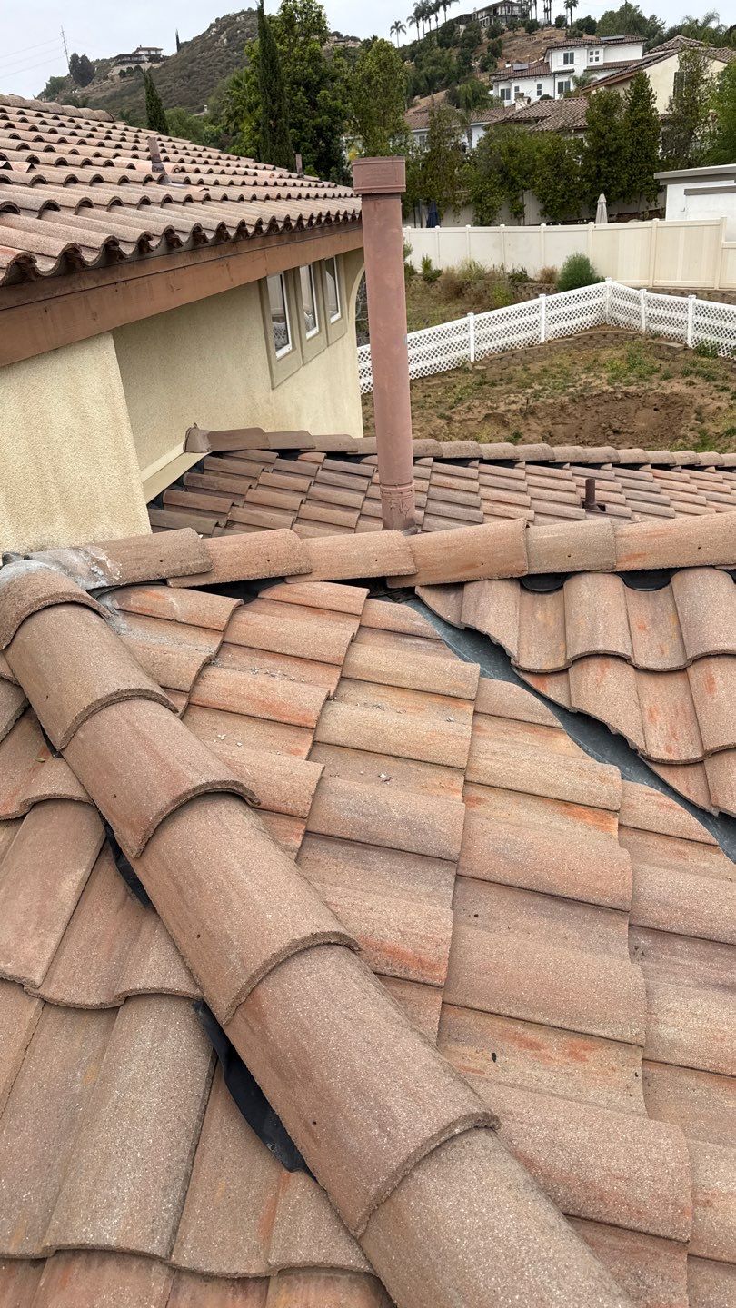Terracotta Tile Roof Repair and Ridge Cap Sealing in Escondido by Reliable Roofing San Diego Inc.