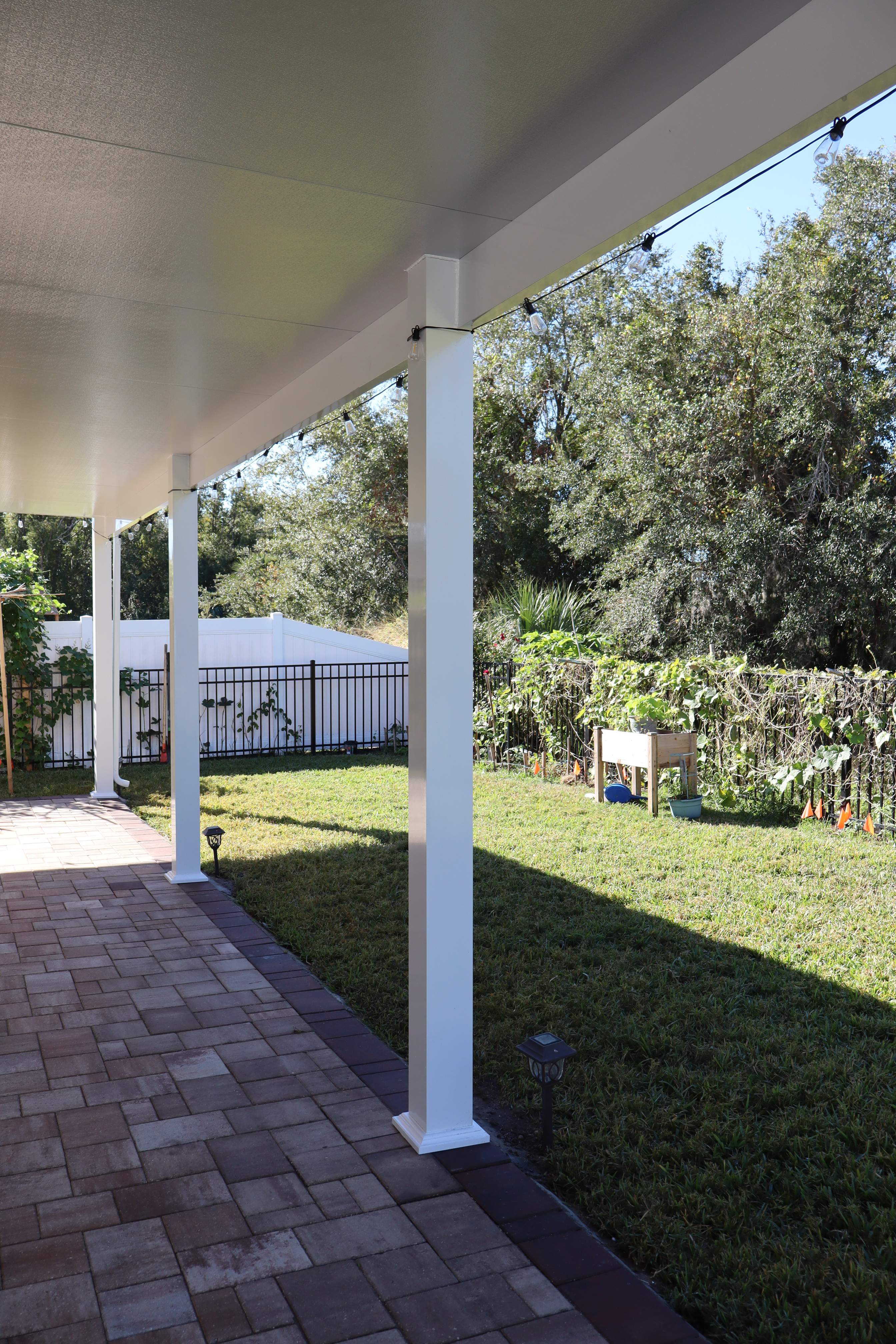 Patio cover with kitchen by Orlando pergolas 