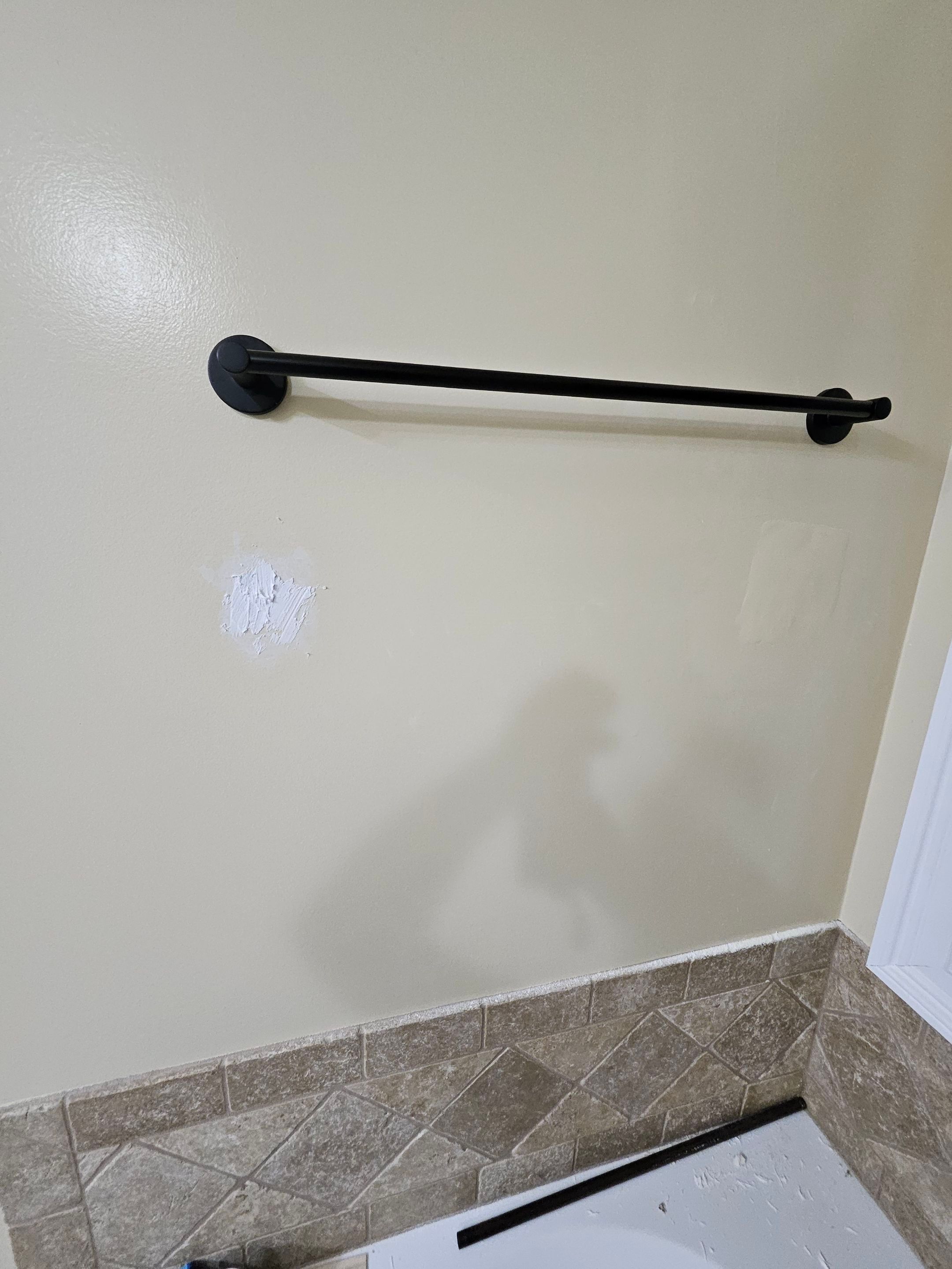 Drywall/door/frame repair and towel hanger installation by Swift Signings and Services LLC