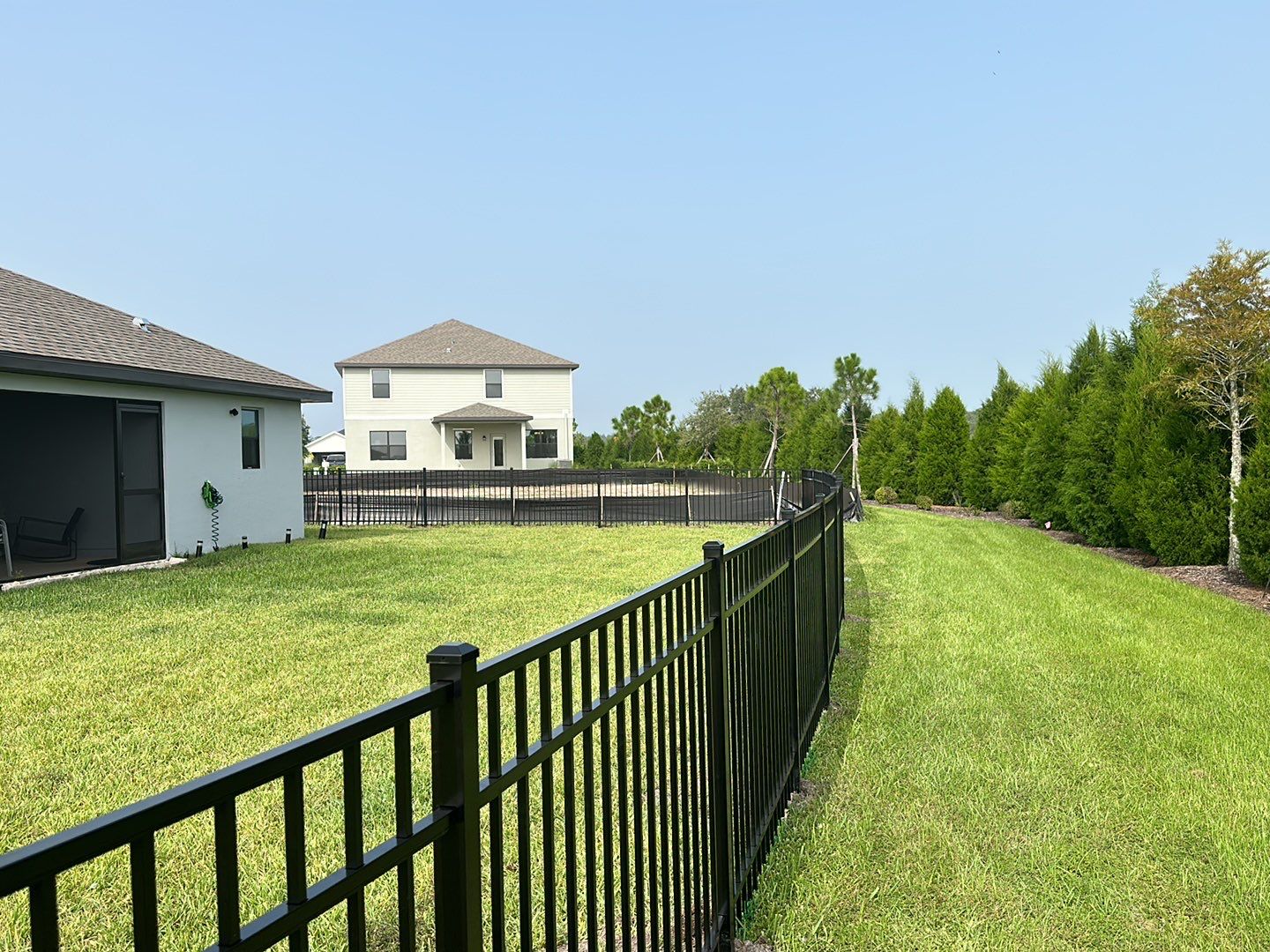 Aluminum Fence Installation using Black 3 Rail Aluminum Fence by Asap fence and gates, LLC