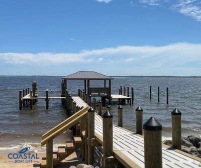 Waterfront Construction + Boat Lift Installation by Coastal Boat Lift Repair LLC