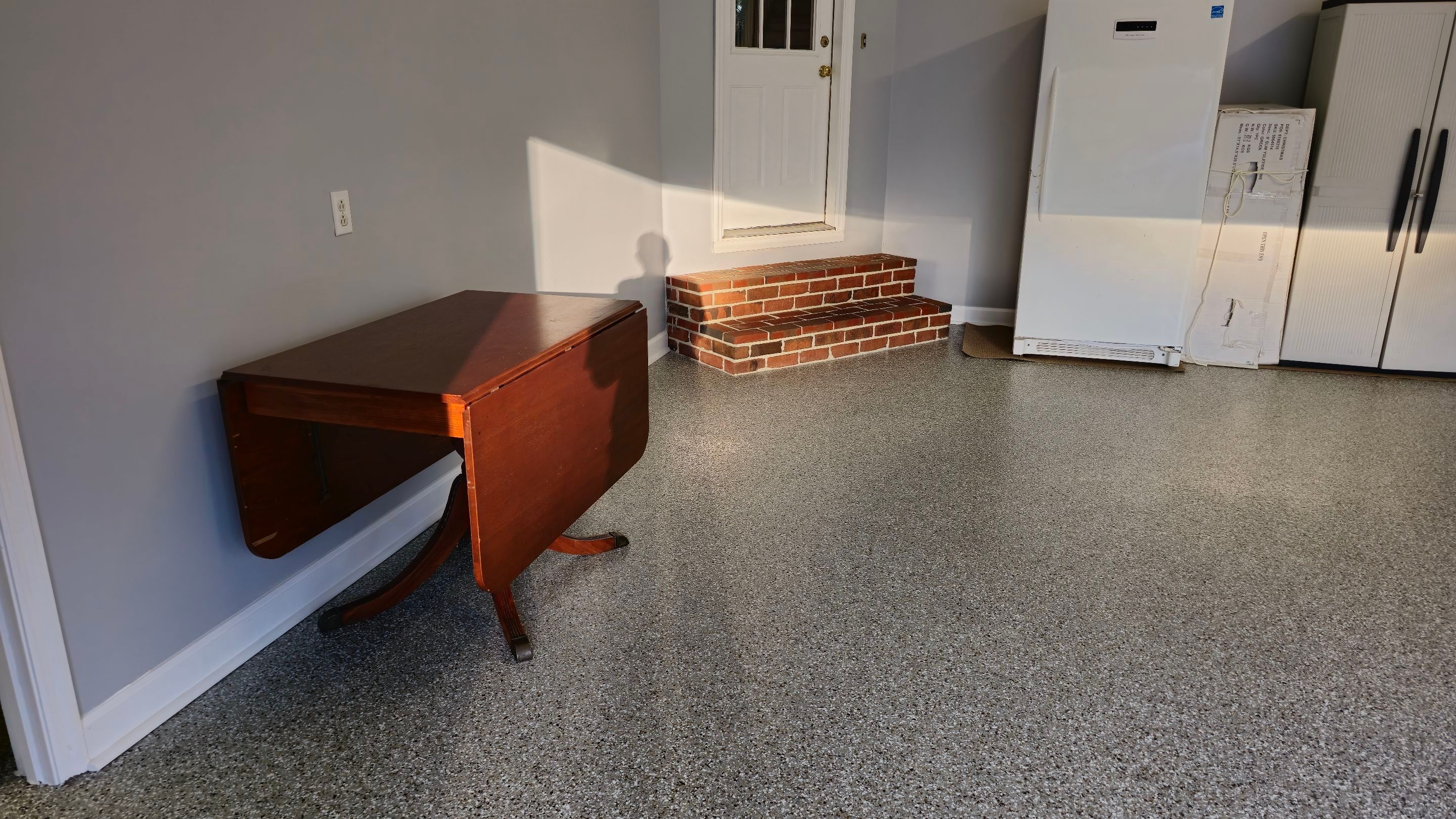 Garage using Creekbed by Elite Floor Solutions