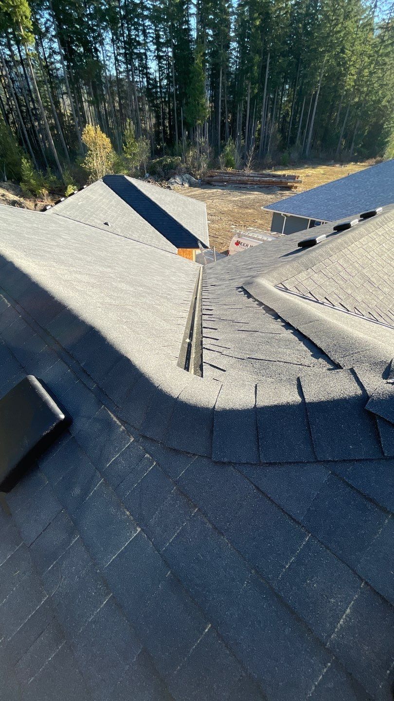 Residential Roofing Installation using OC Oakridge shingles by Top Notch Roofing Inc