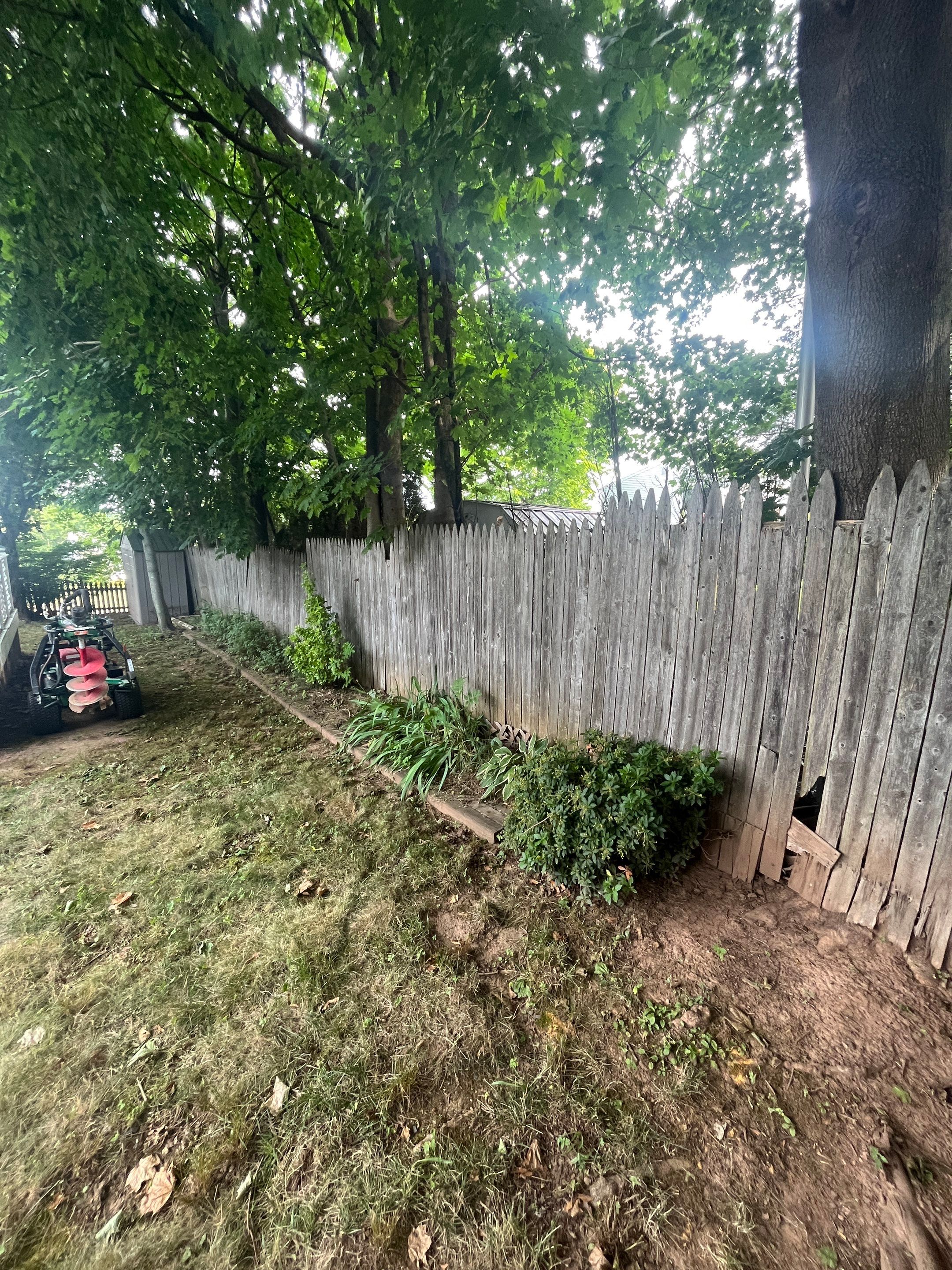 Vinyl privacy fence, Decorative lattice top. Two toned coloring White and Gray by DiGiorgi Roofing and Siding Inc