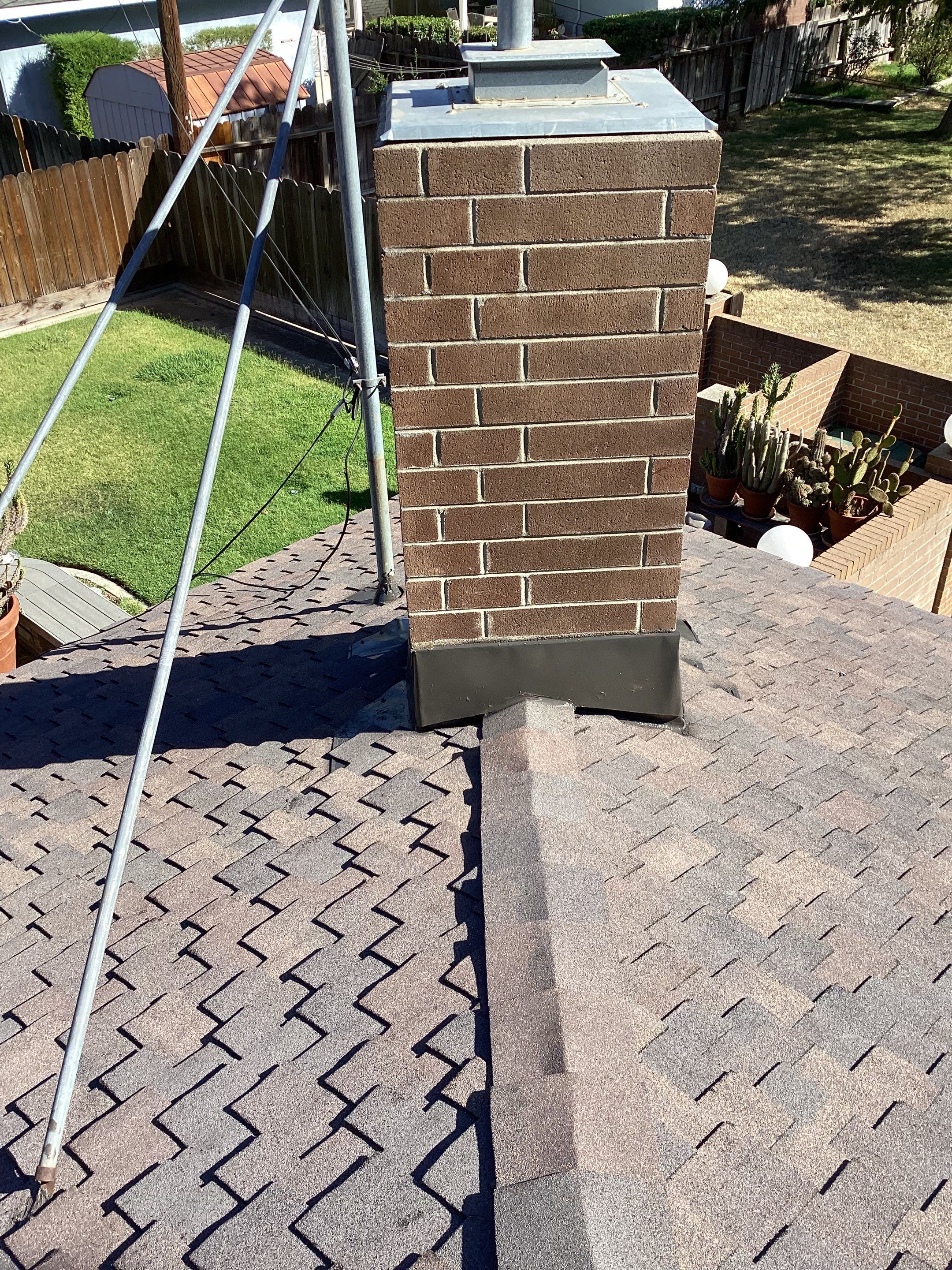 Installation of Certainteed Presidential shingles on residential house by Straight Edge Roofing Inc