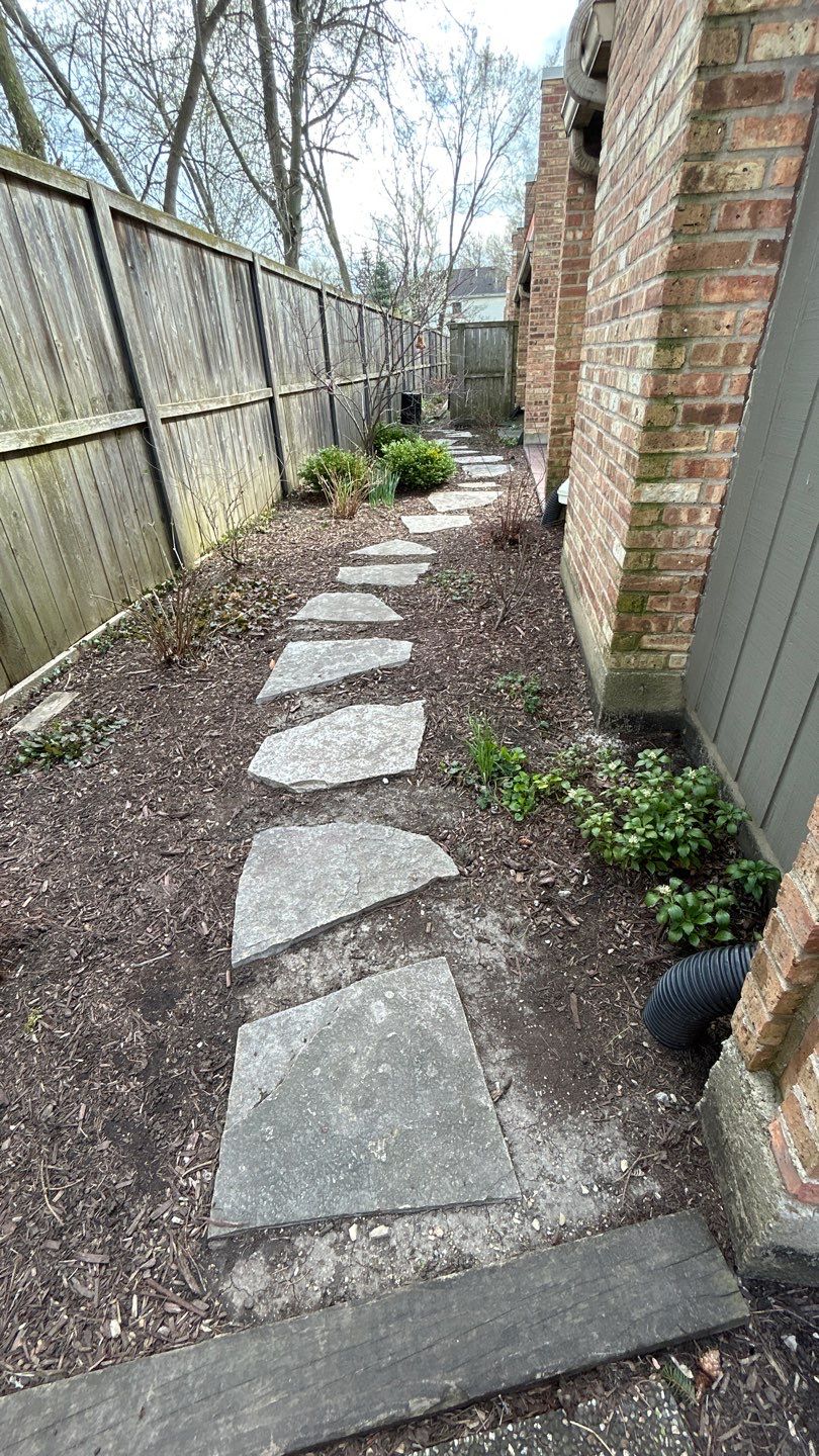 Flagstone stepper cleaning by Northern Power Washing LLC.