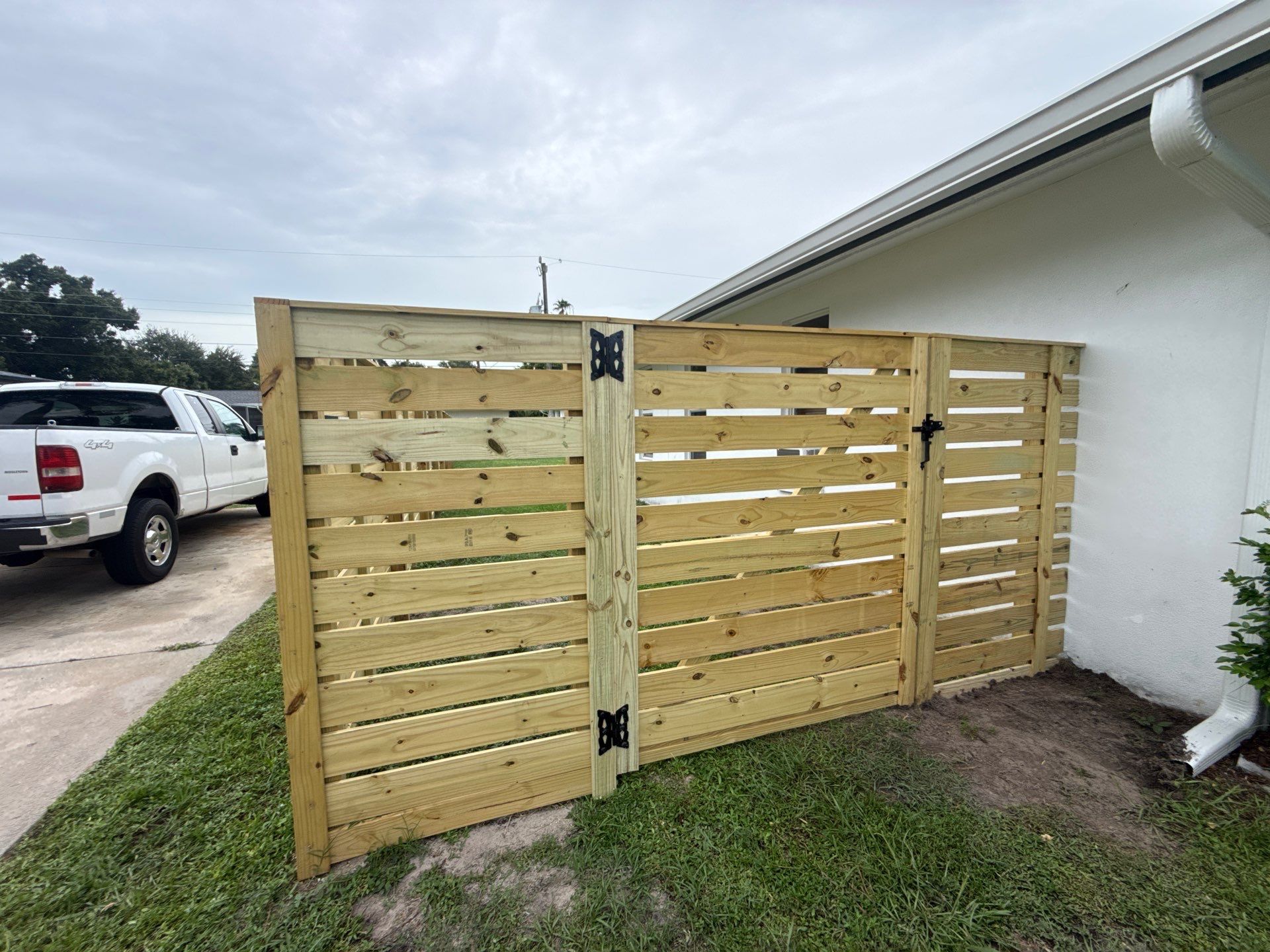 Modern Horizontal Wood Privacy Fence Installation in Fort Myers by True Fence LLC