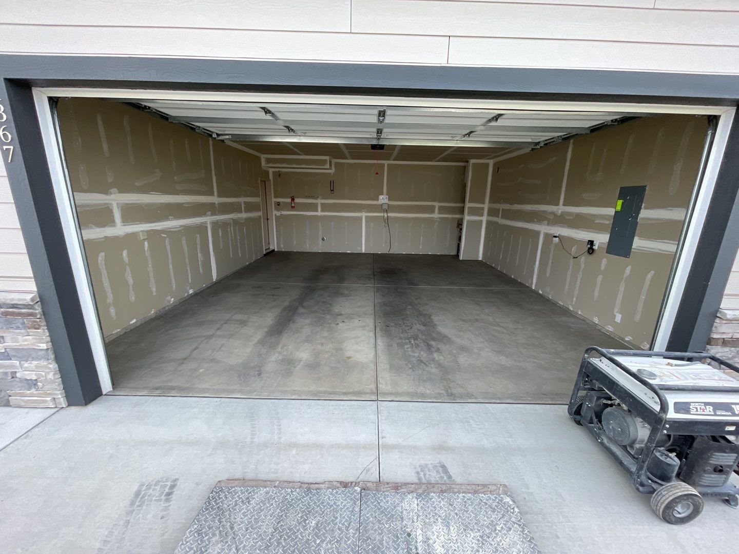 Garage Transformation using Slate Stone by Croc Coatings, LLC