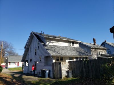 ATLAS PINNACLE COLOR: SCOTCHGARD COASTAL GRANITE DRIP EDGE: WHITE