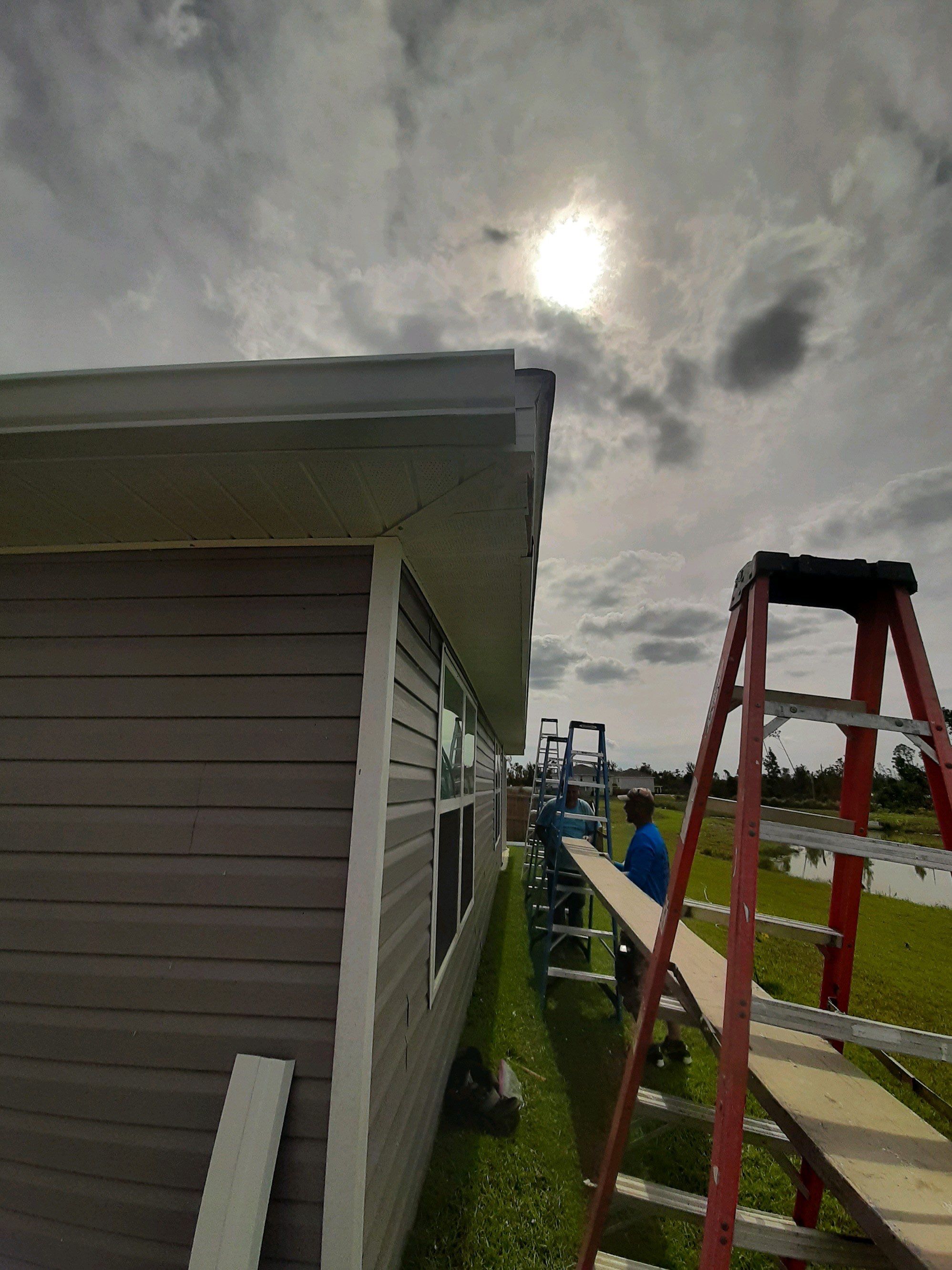 Gutter Installation using K-Style Seamless Gutters and Soffit and Fascia Replacement by Gutter Professors