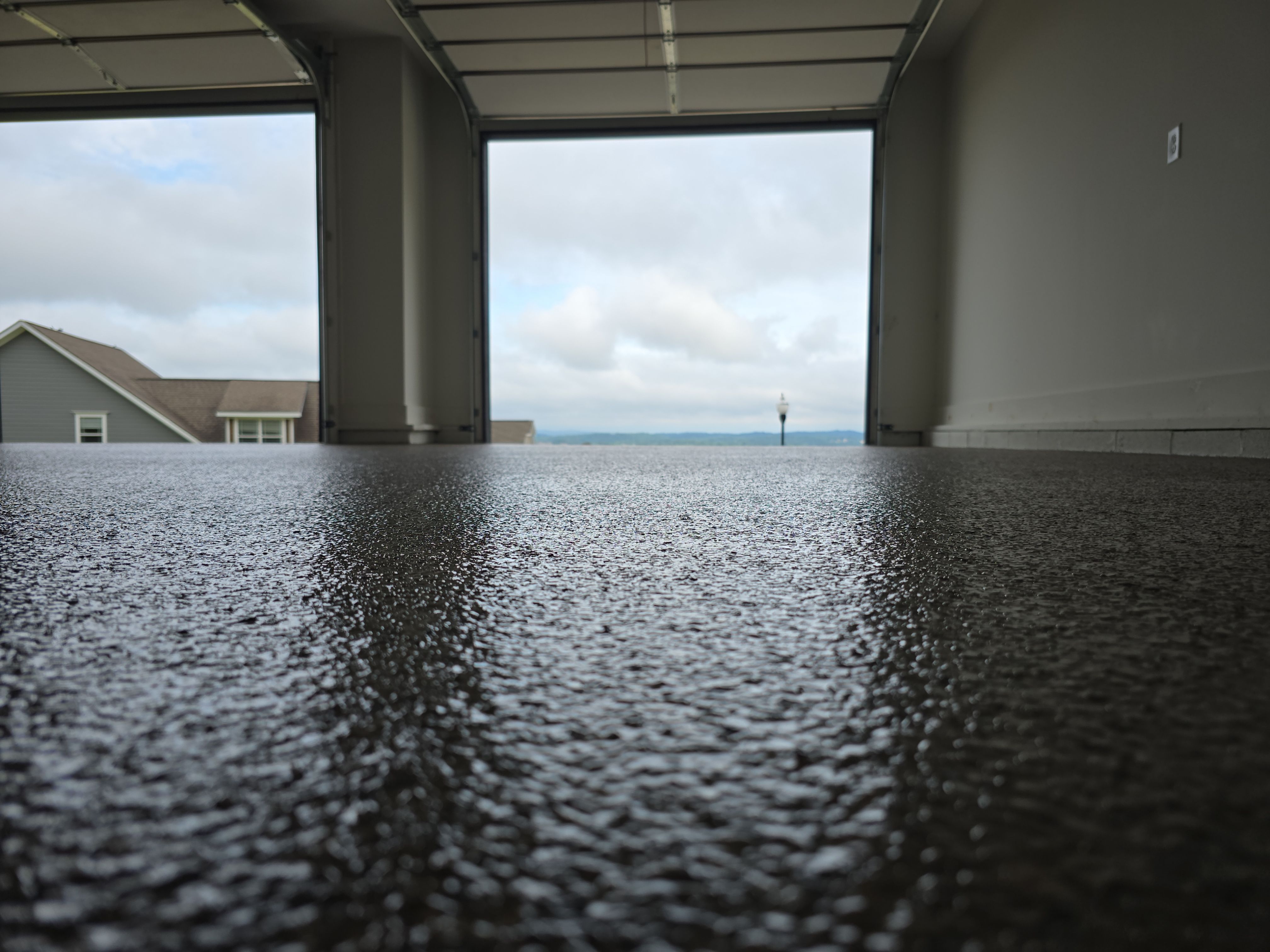 Front Porch and Garage using Obsidian by Elite Floor Solutions