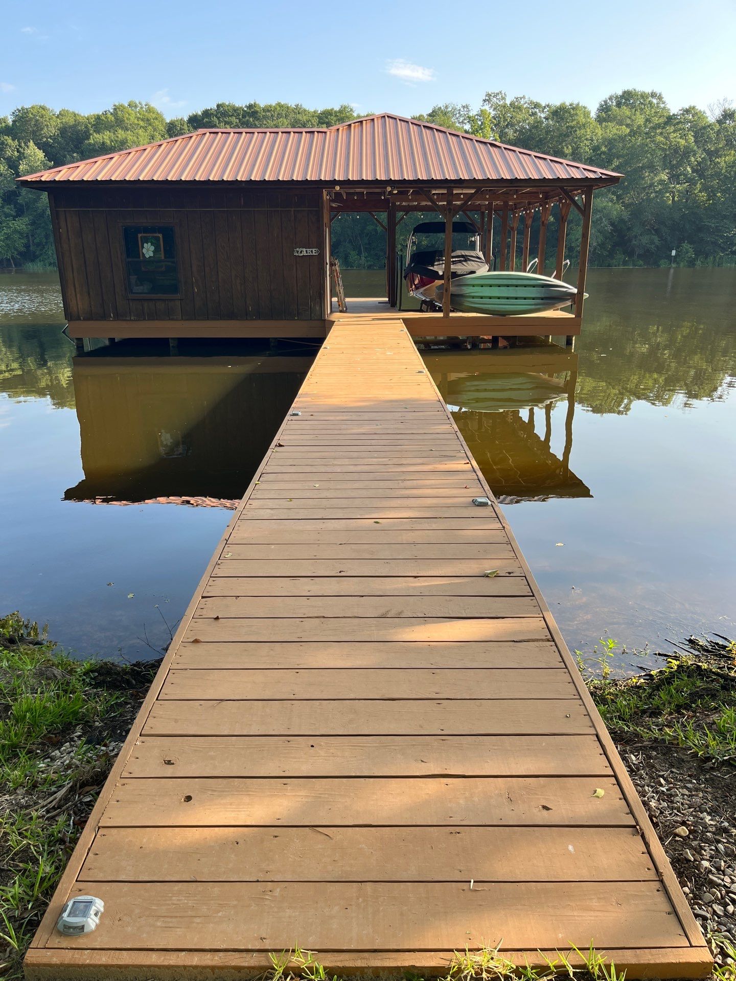 Exterior Painting in Arp, TX | Lake House & Deck Restoration by Quality Coats Painting