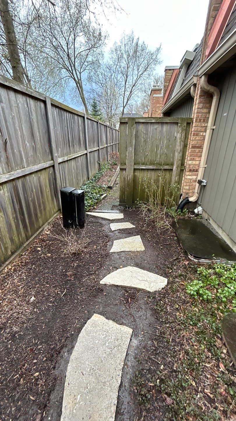 Flagstone stepper cleaning by Northern Power Washing LLC.