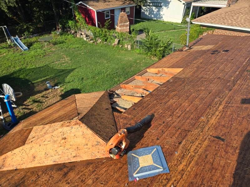 New Roof and Exterior Paint by Harvey Roofing & Construction