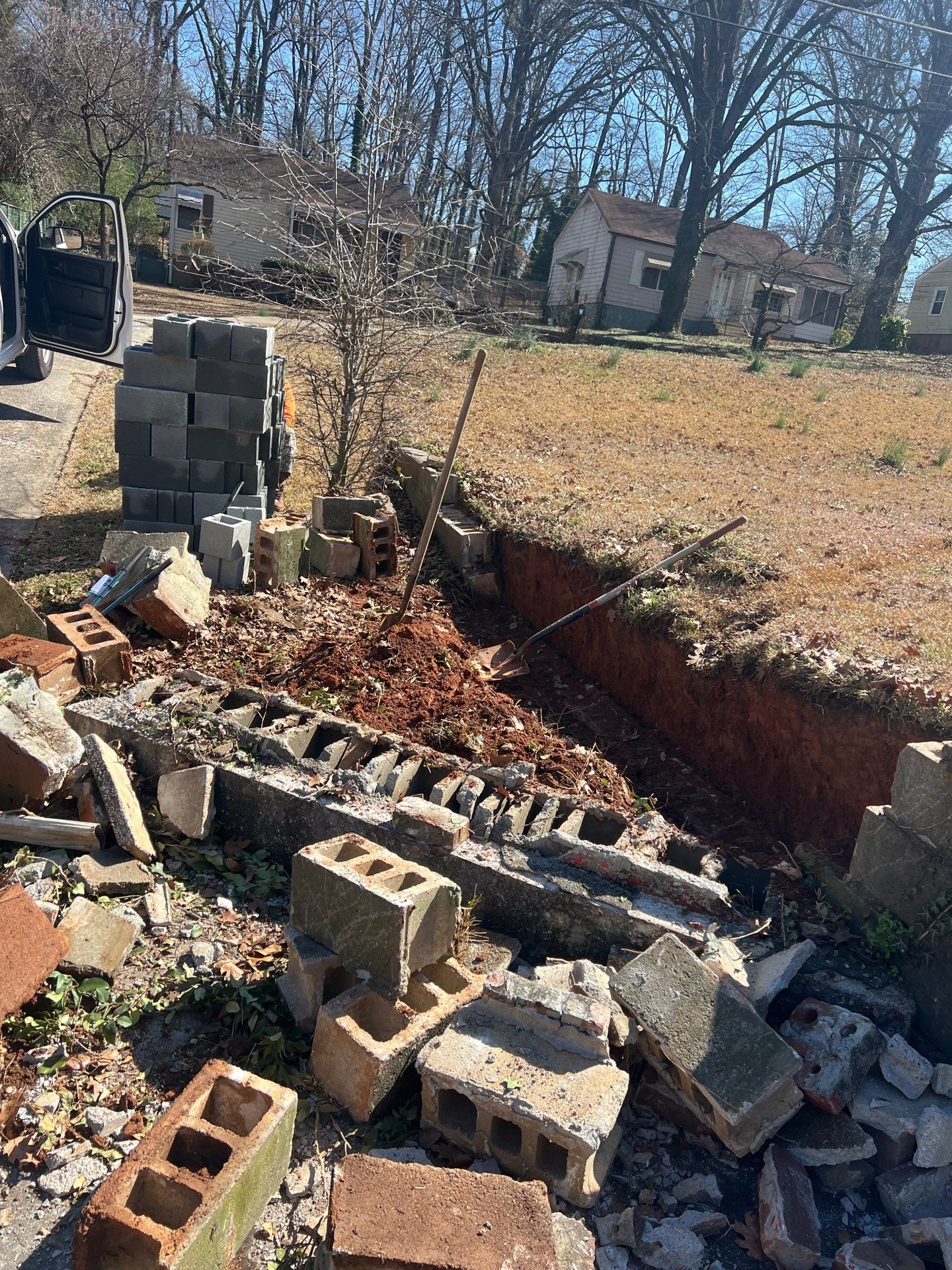 Retaining wall repair by Atlanta Landscape LLC